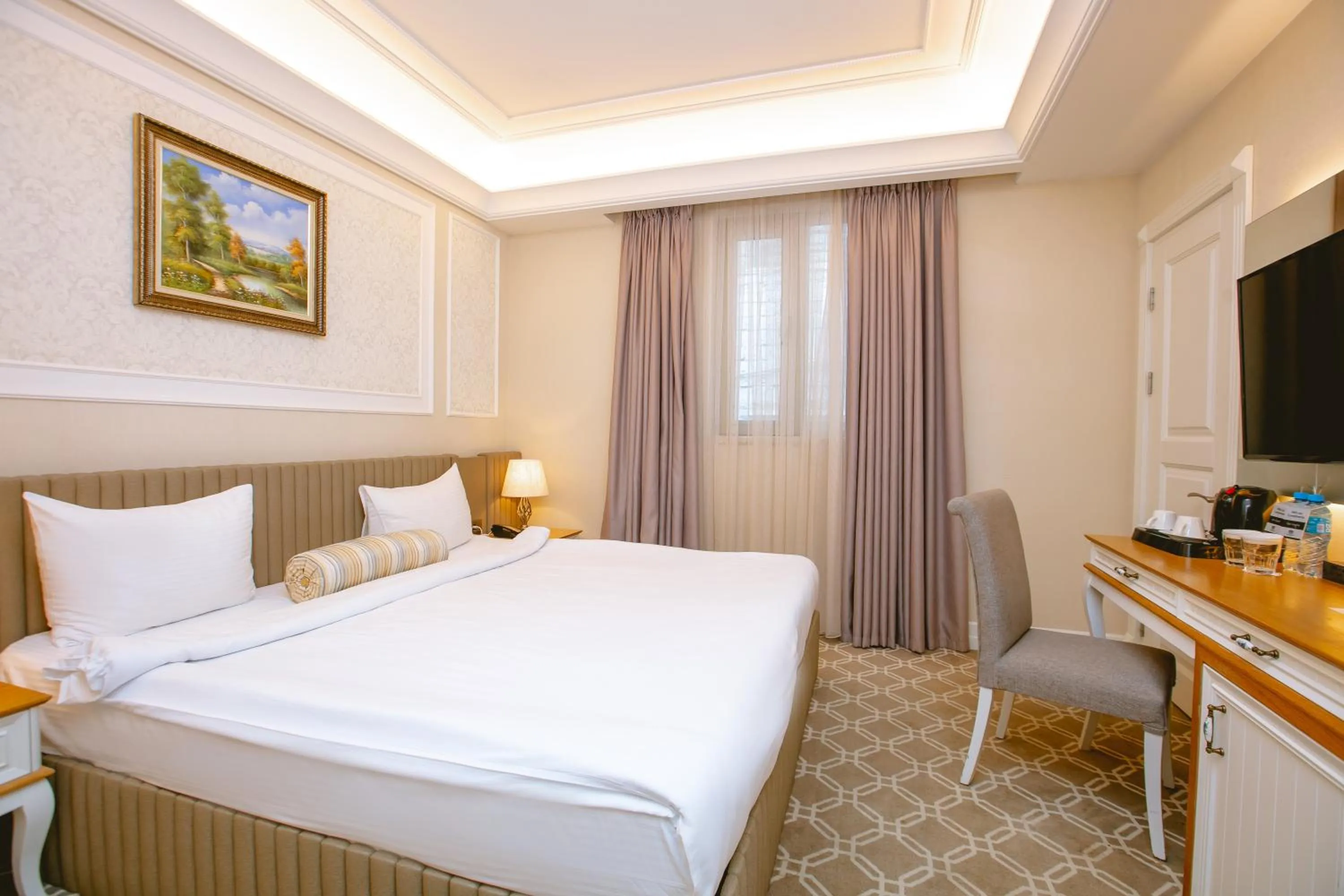 Bed in Theatrum Hotel Baku