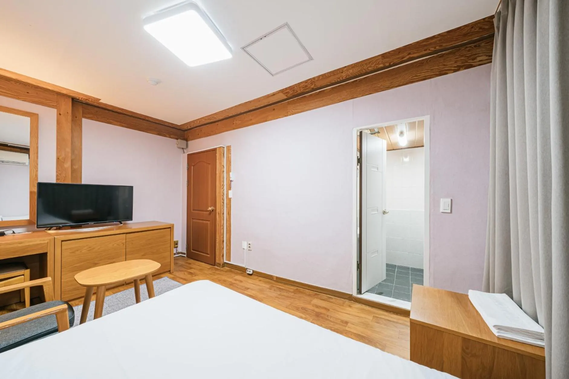 Bed in Jeju Miracle Hotel