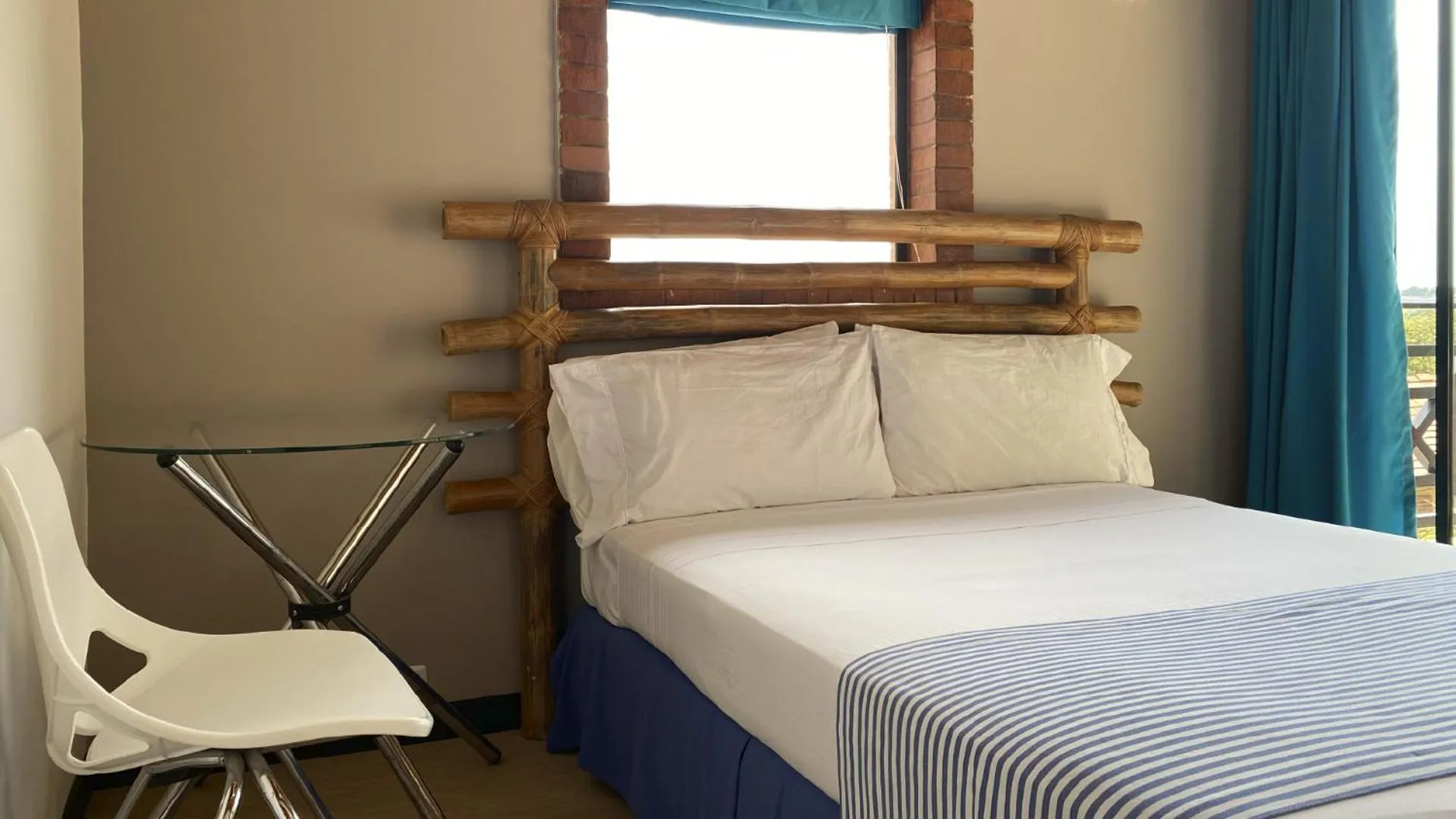 Bed in Hotel Girardot Resort by On Vacation