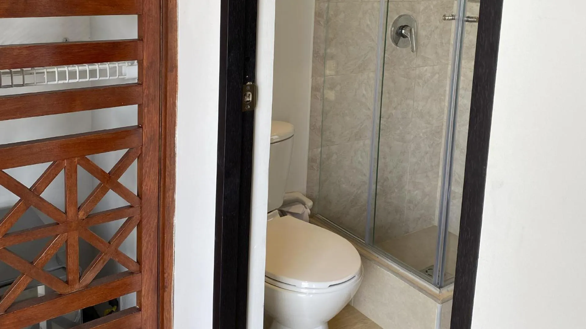 Shower in Hotel Girardot Resort by On Vacation