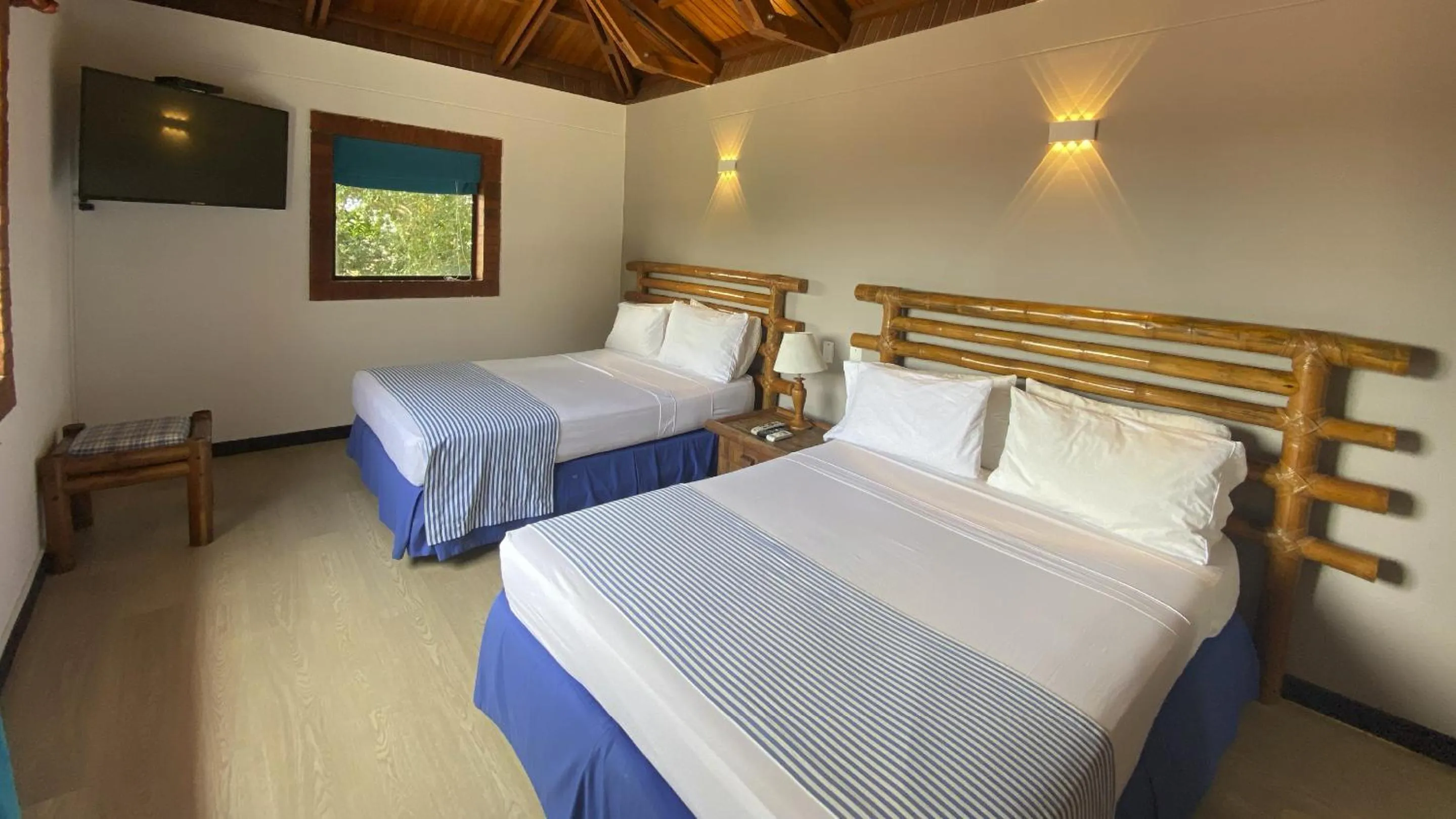 Bed in Hotel Girardot Resort by On Vacation