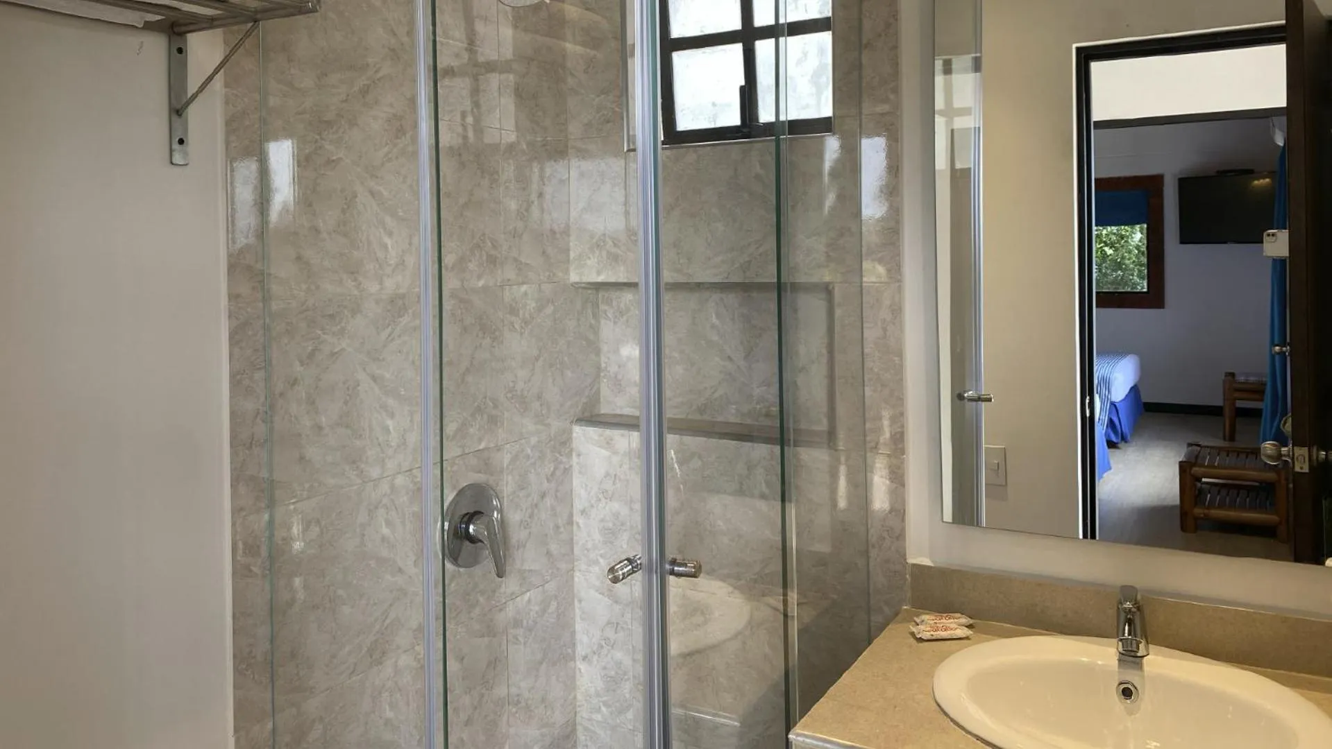 Shower in Hotel Girardot Resort by On Vacation