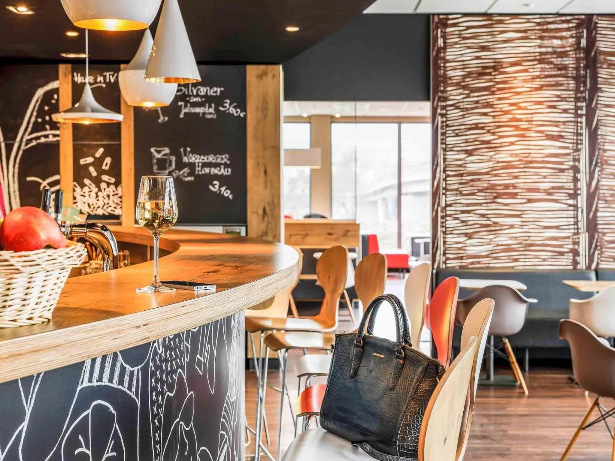 Lounge or bar in ibis Hotel Würzburg City