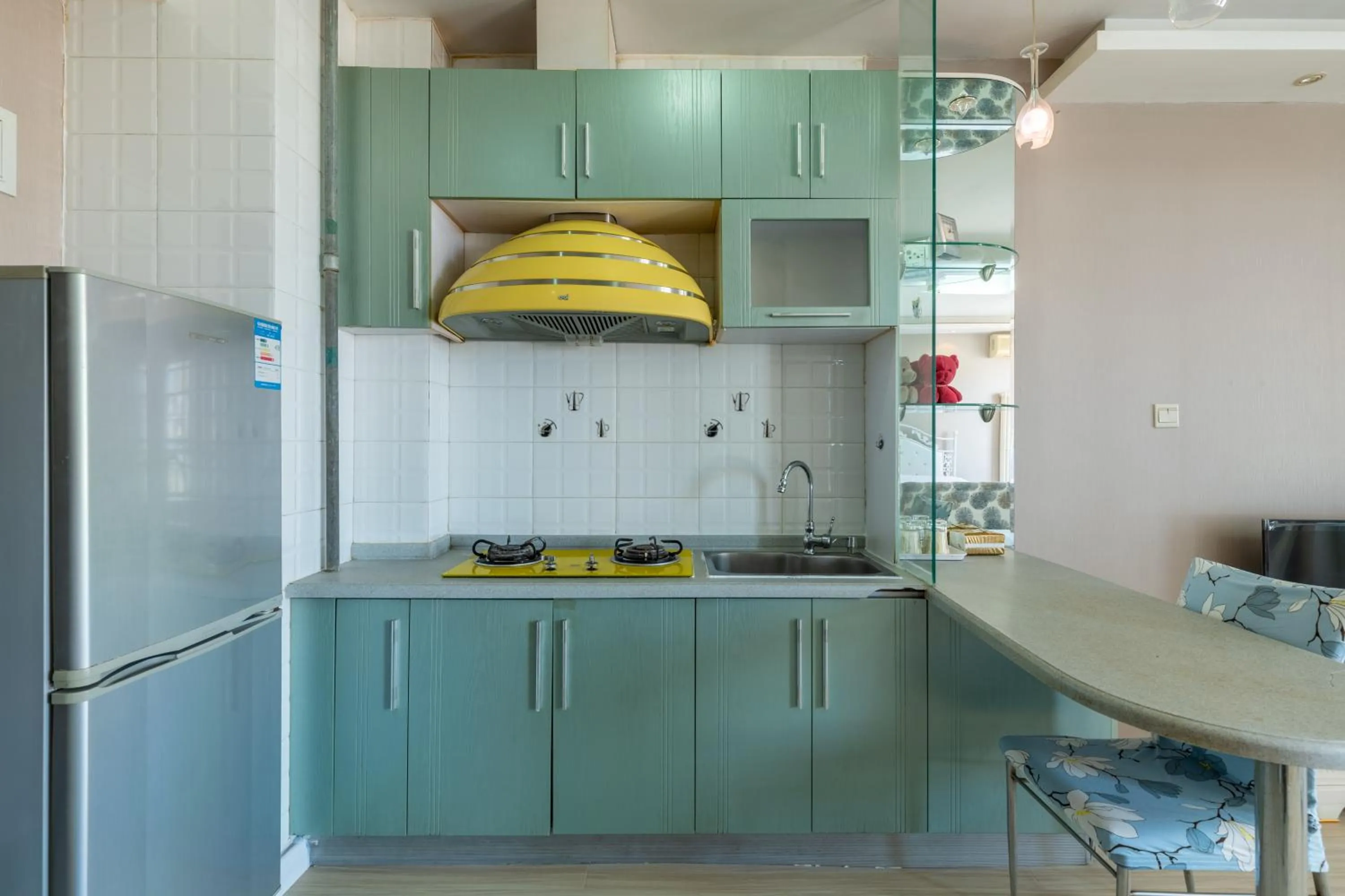 Kitchen or kitchenette in Dalian Xiuzhu Mansion Apartment