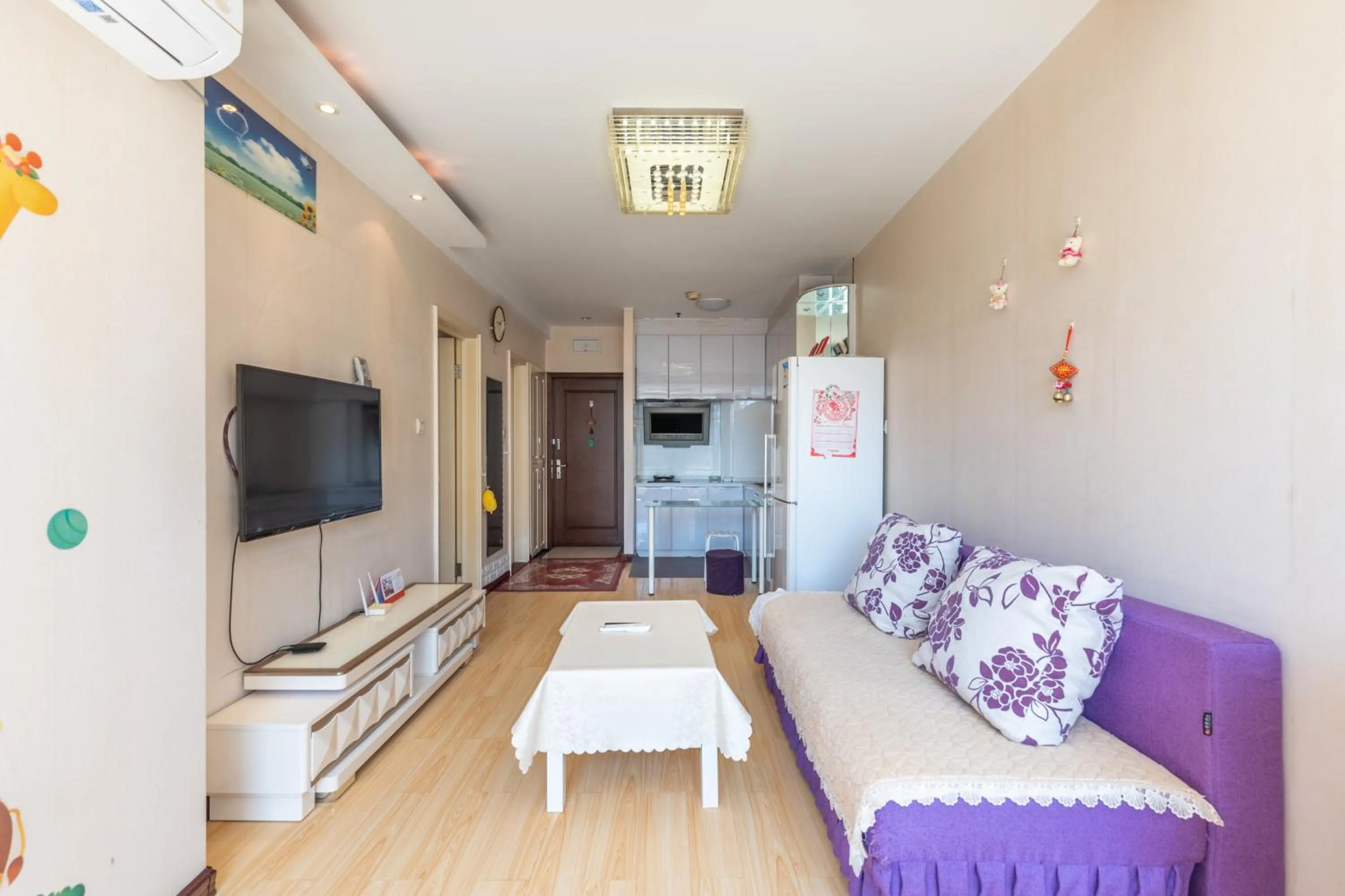 TV and multimedia, Bed in Dalian Xiuzhu Mansion Apartment