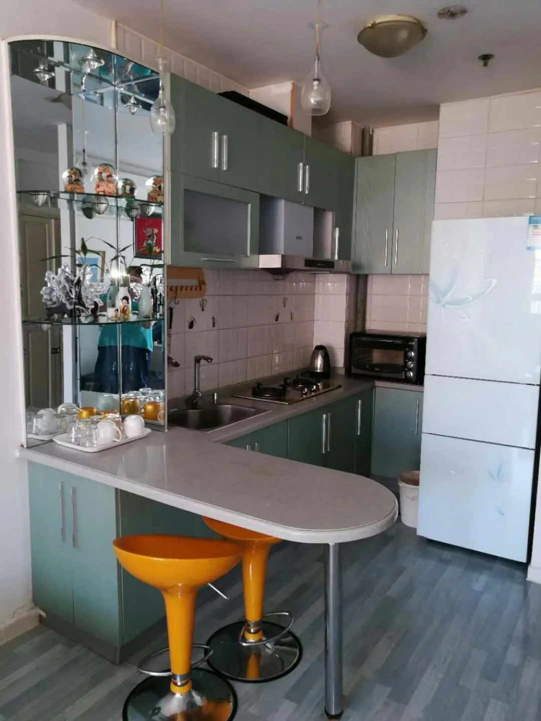Kitchen or kitchenette in Dalian Xiuzhu Mansion Apartment