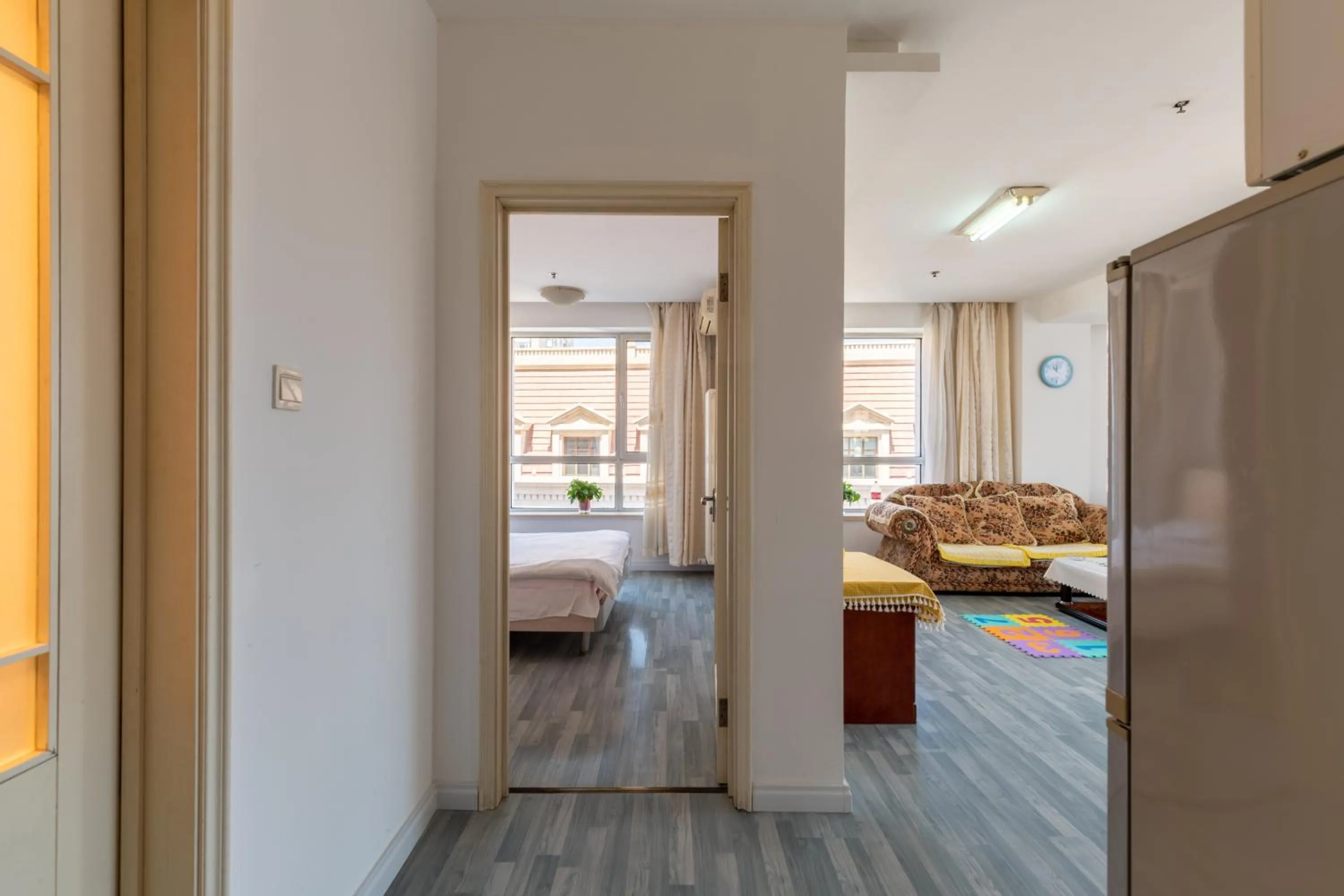 Photo of the whole room, Bed in Dalian Xiuzhu Mansion Apartment