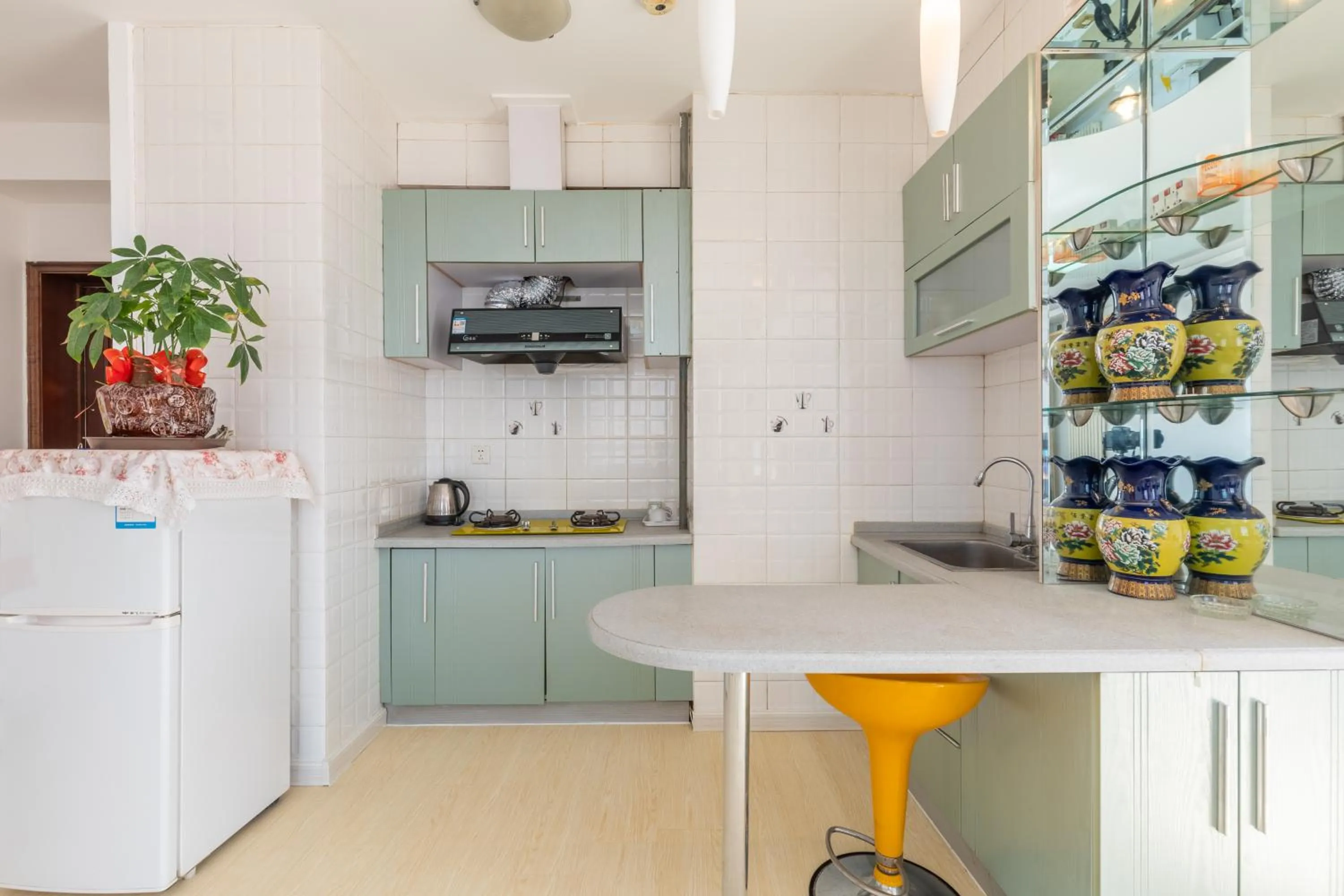 Kitchen or kitchenette in Dalian Xiuzhu Mansion Apartment