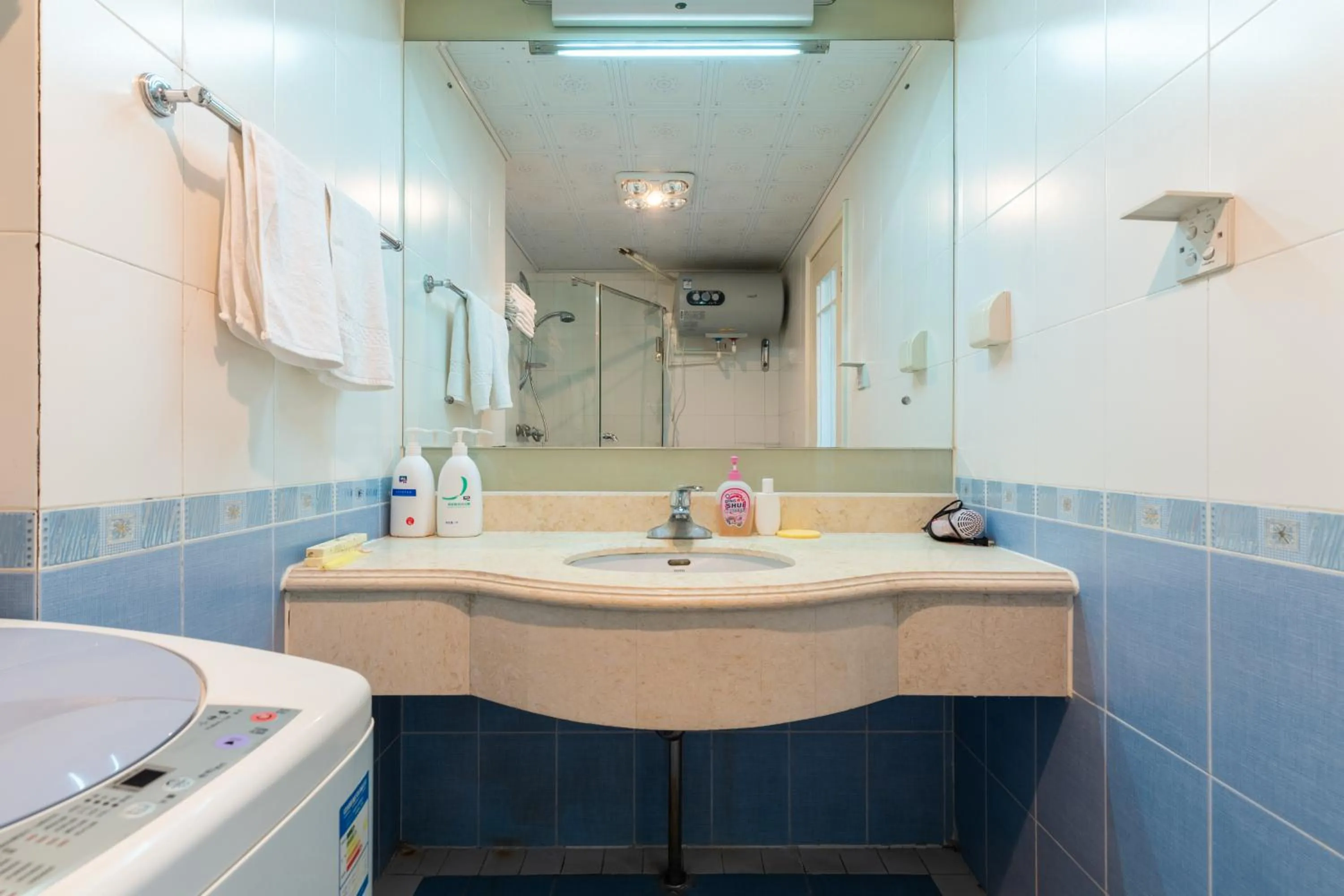 Bathroom in Dalian Xiuzhu Mansion Apartment