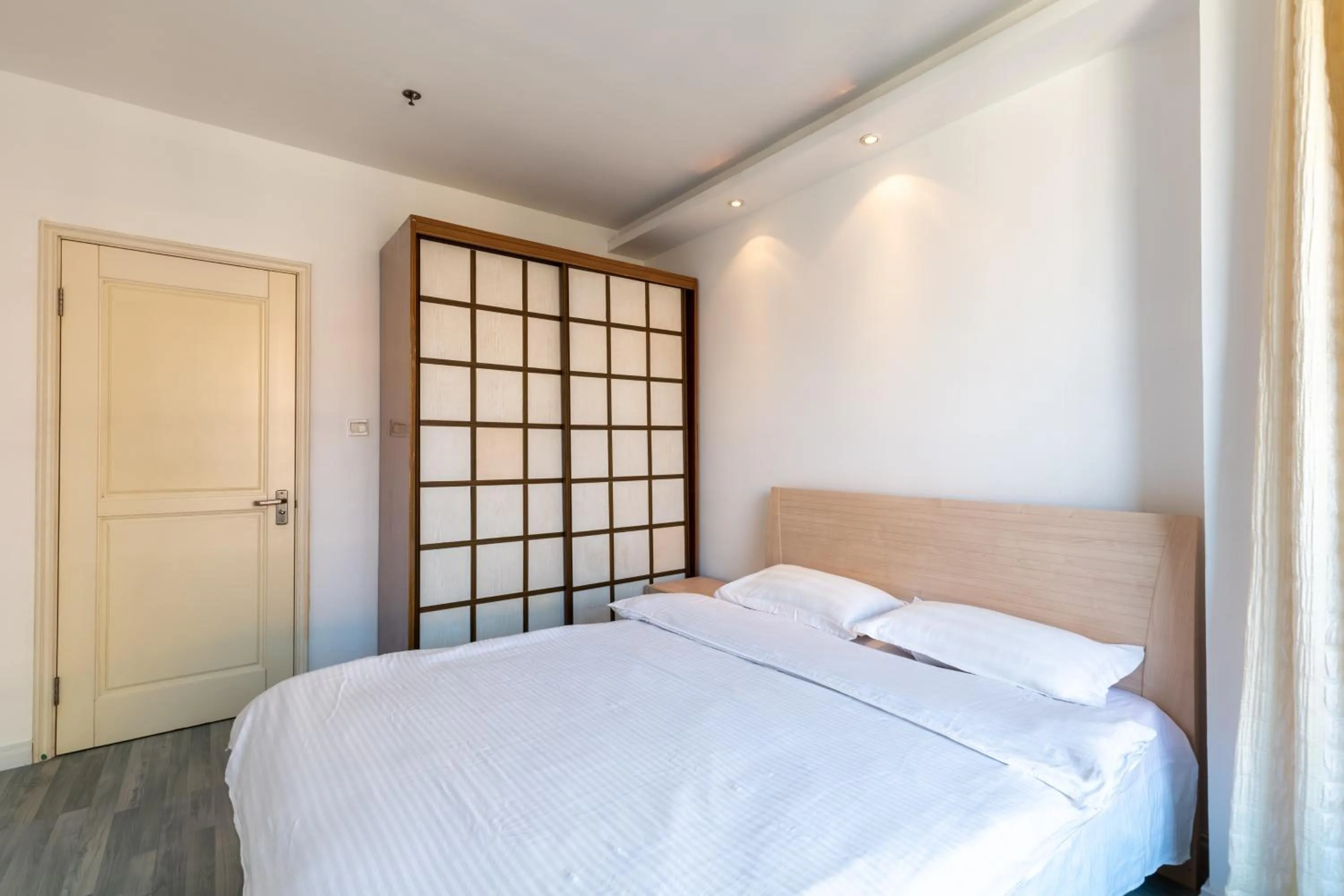 Bedroom, Bed in Dalian Xiuzhu Mansion Apartment