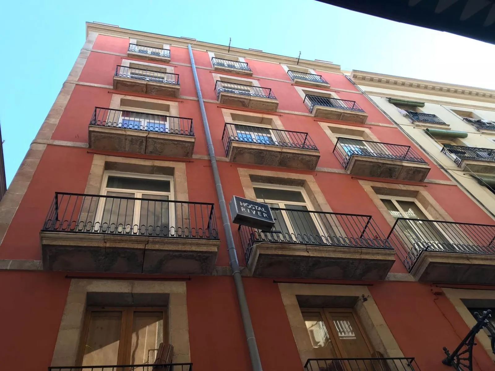 Property building in Hostal River