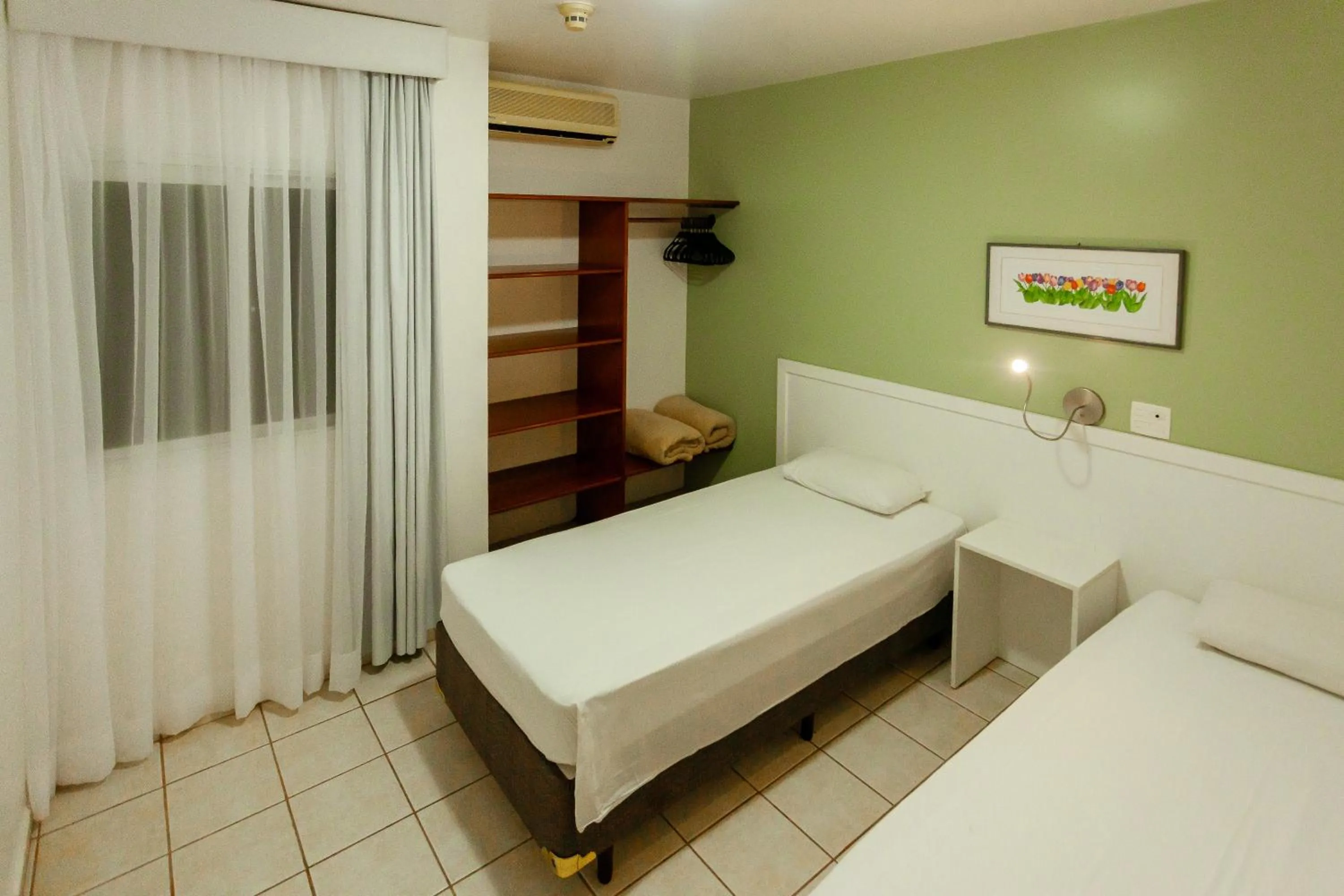 Bed in Vistabela Resort & Spa