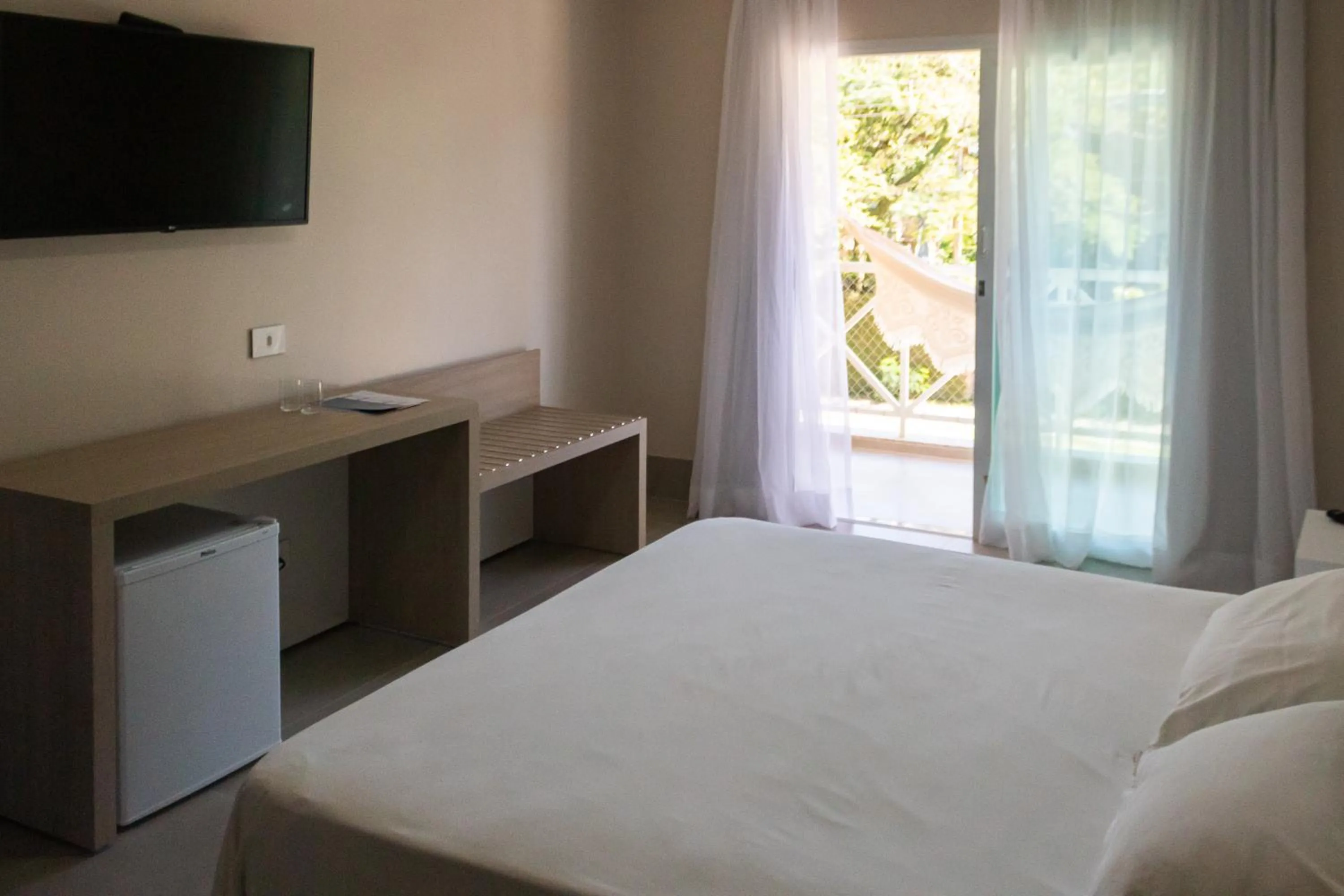 Bed in Vistabela Resort & Spa