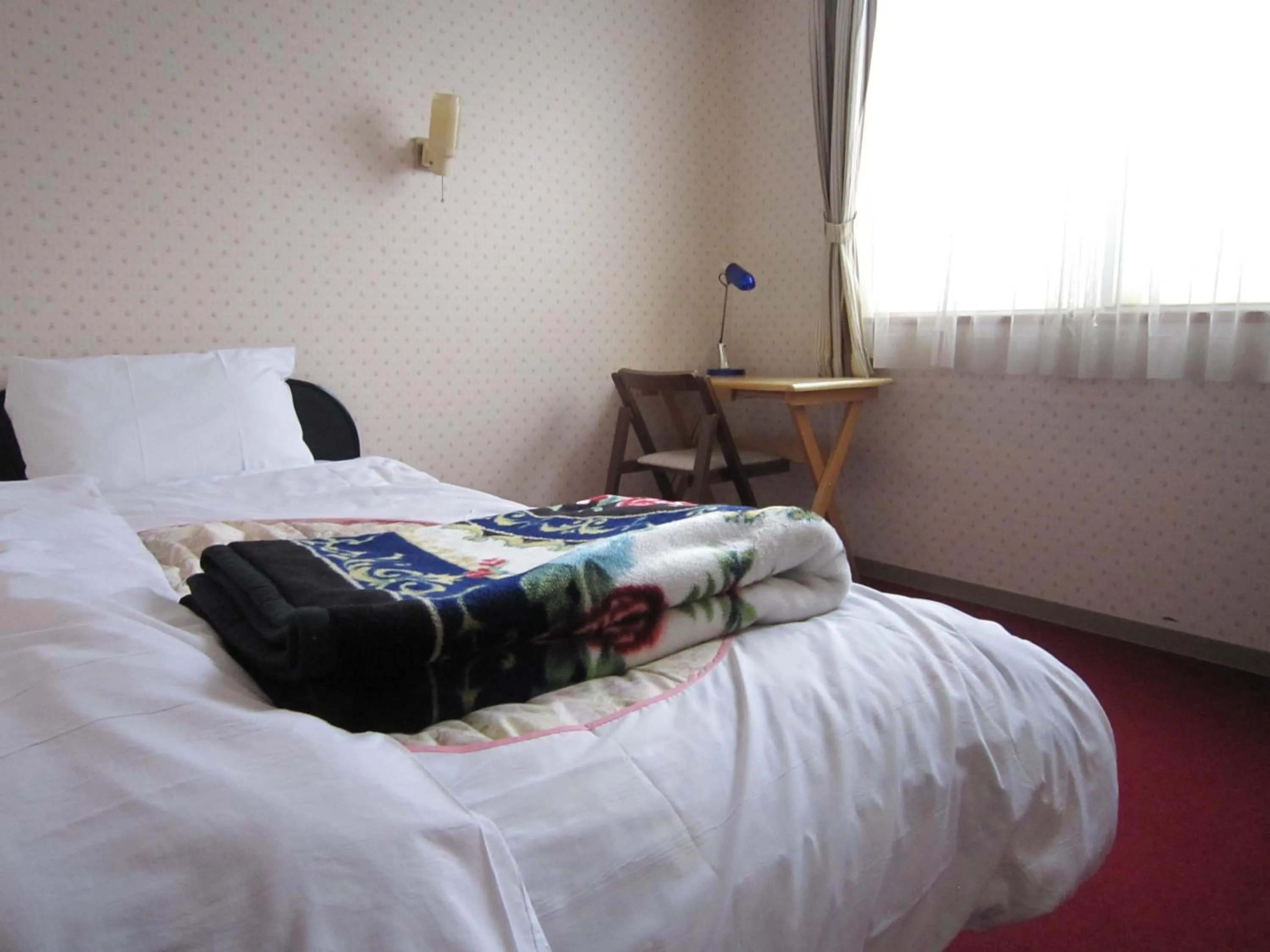 Bed in Pension Kitashirakawa