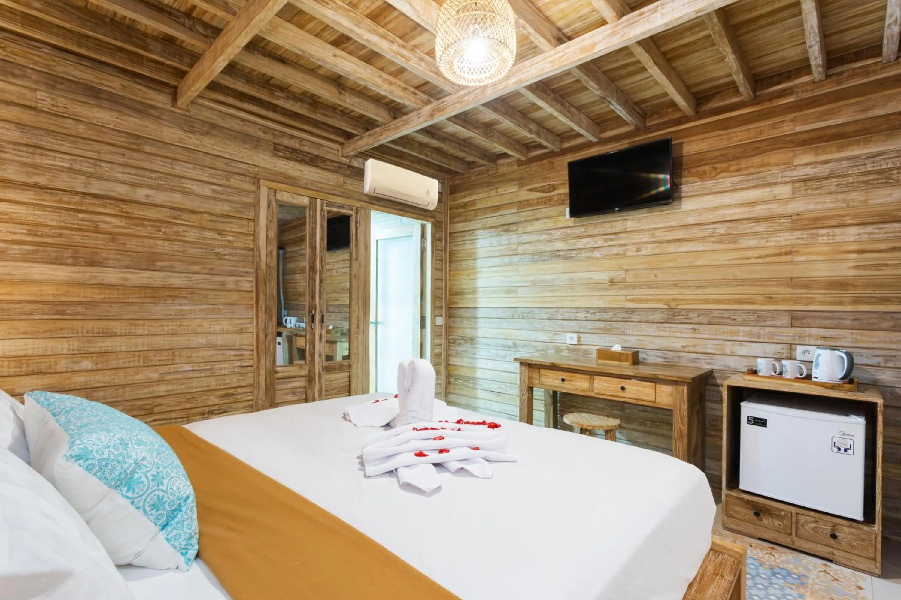 Bed in The Dewi Premier Nusa Penida