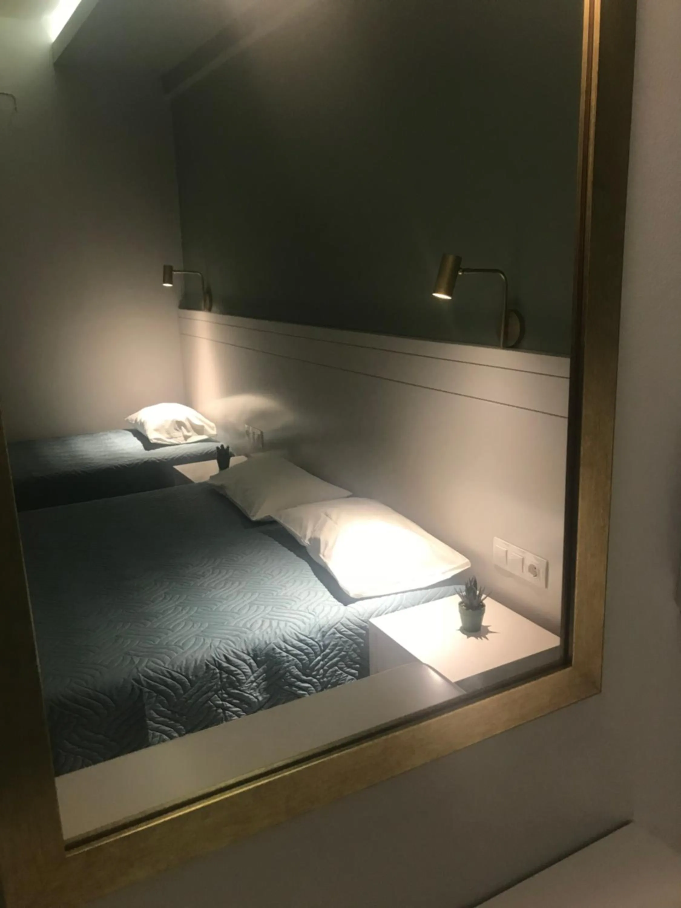 Bed in George Deluxe Apartments