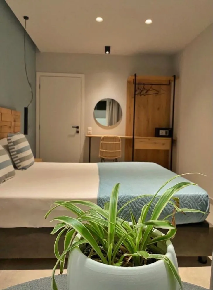 Bed in George Deluxe Apartments