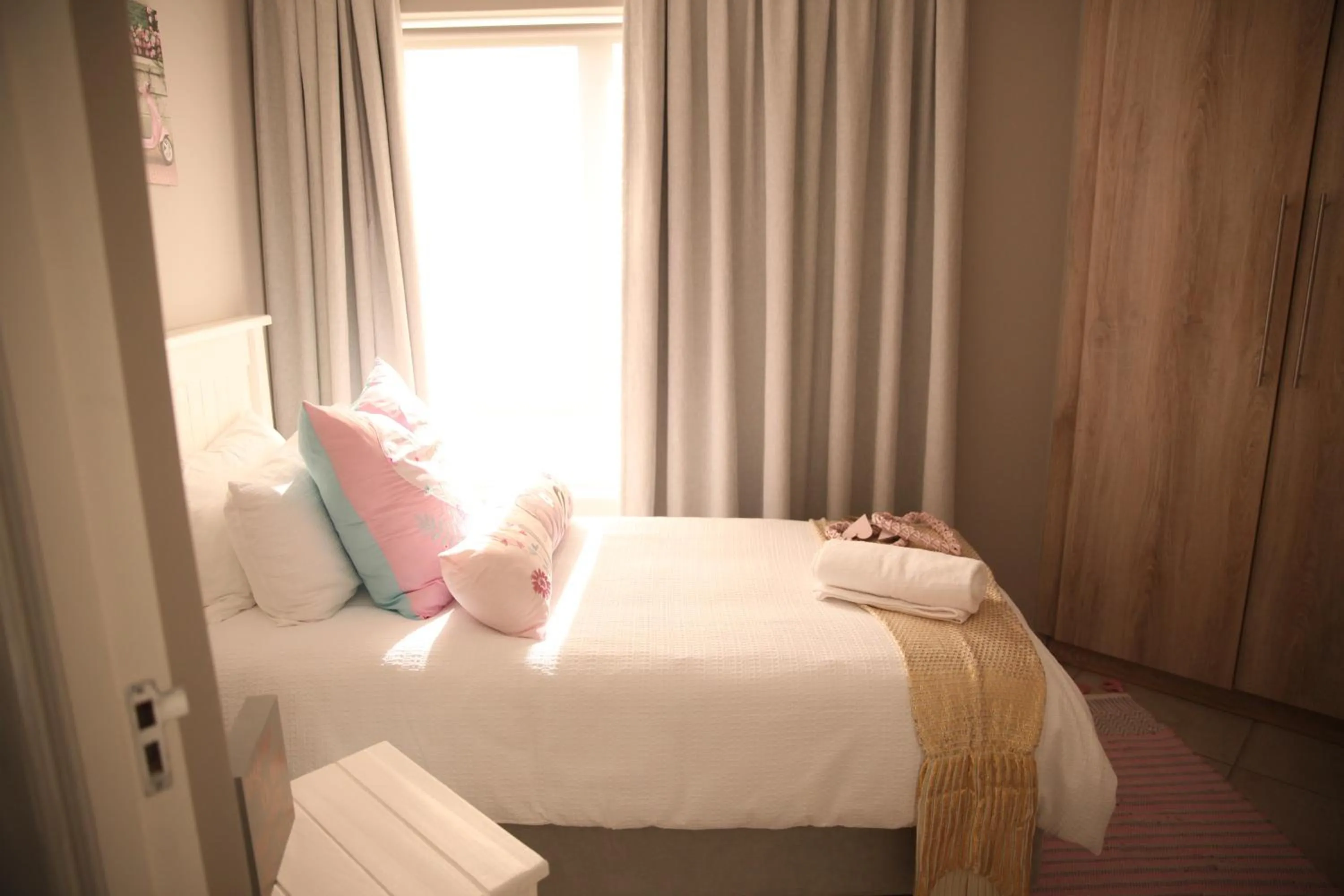 Bed in Mari-Amor Self-Catering Apartments