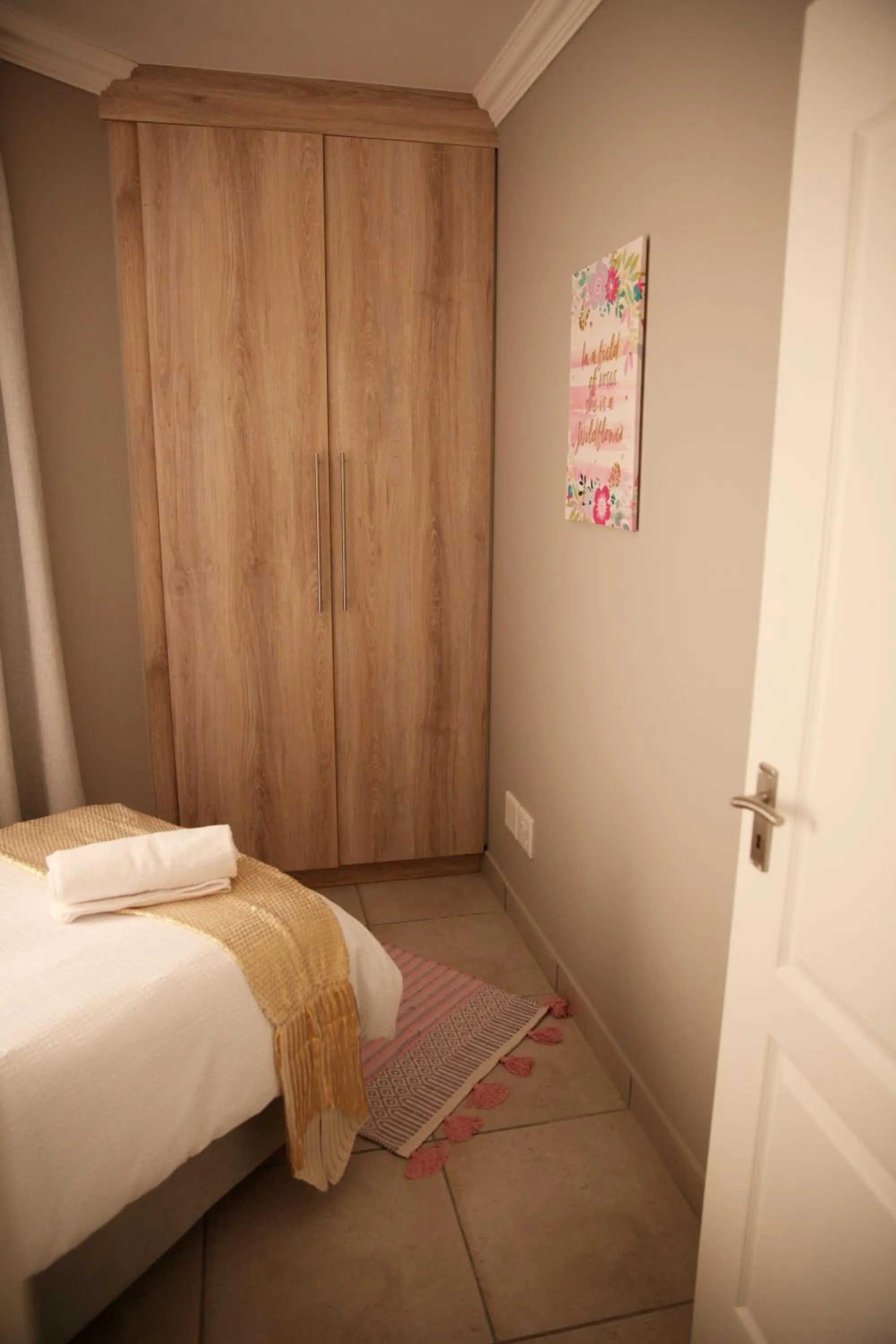 Bed in Mari-Amor Self-Catering Apartments