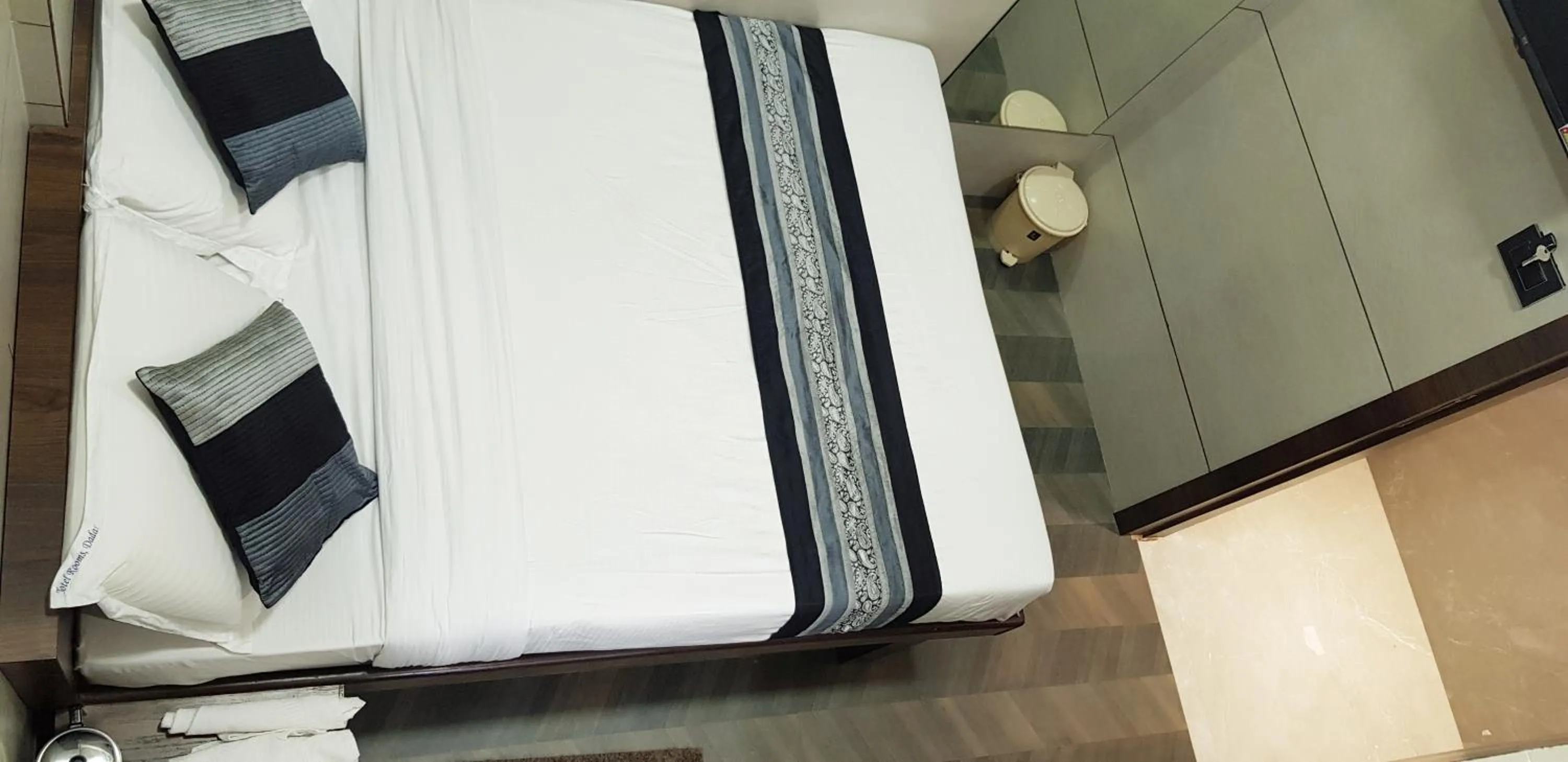 Photo of the whole room, Bed in Hotel Rooms Dadar near Station