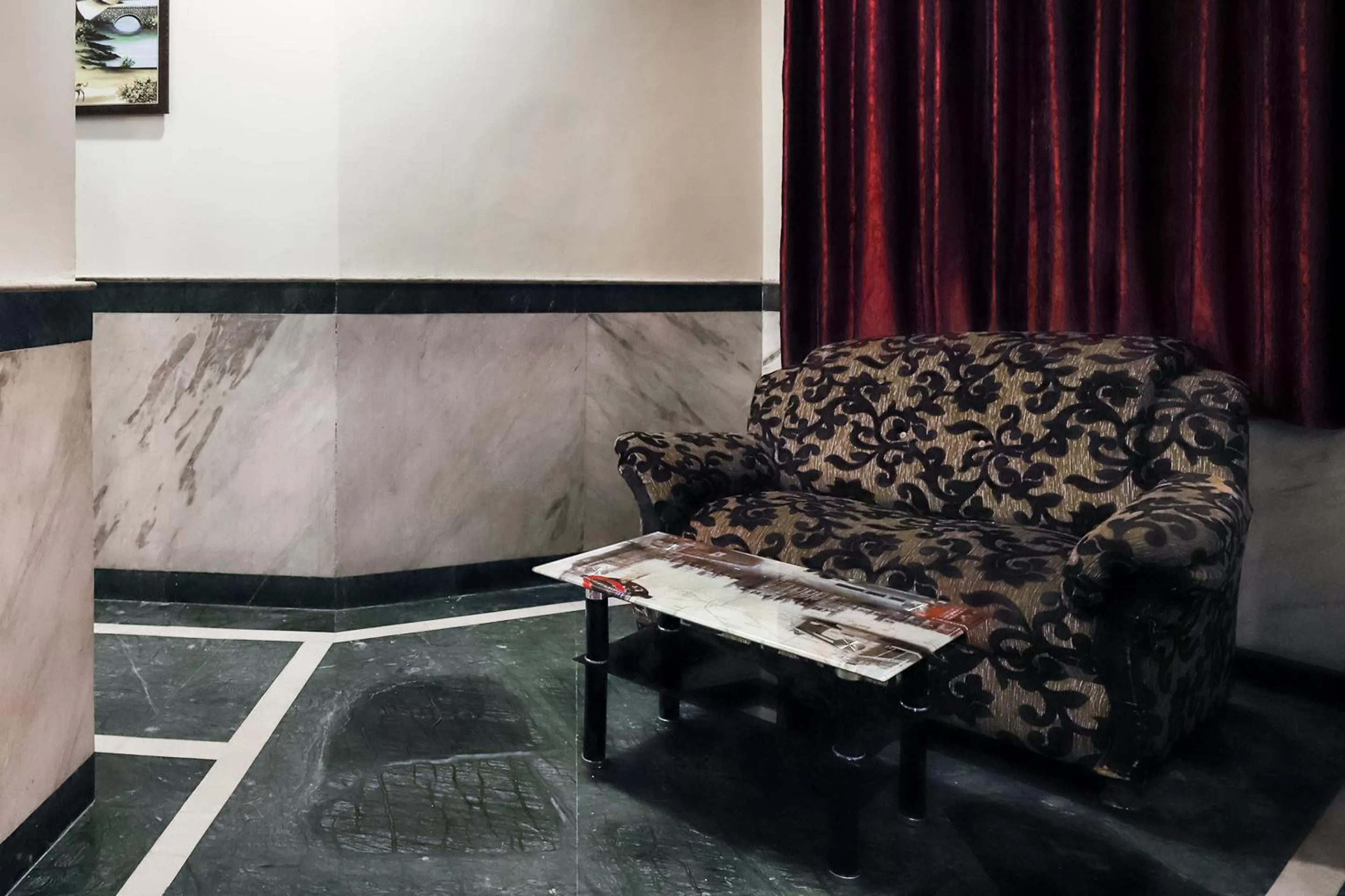 Living room in Collection O Ramji Grand Near Tdi Mall