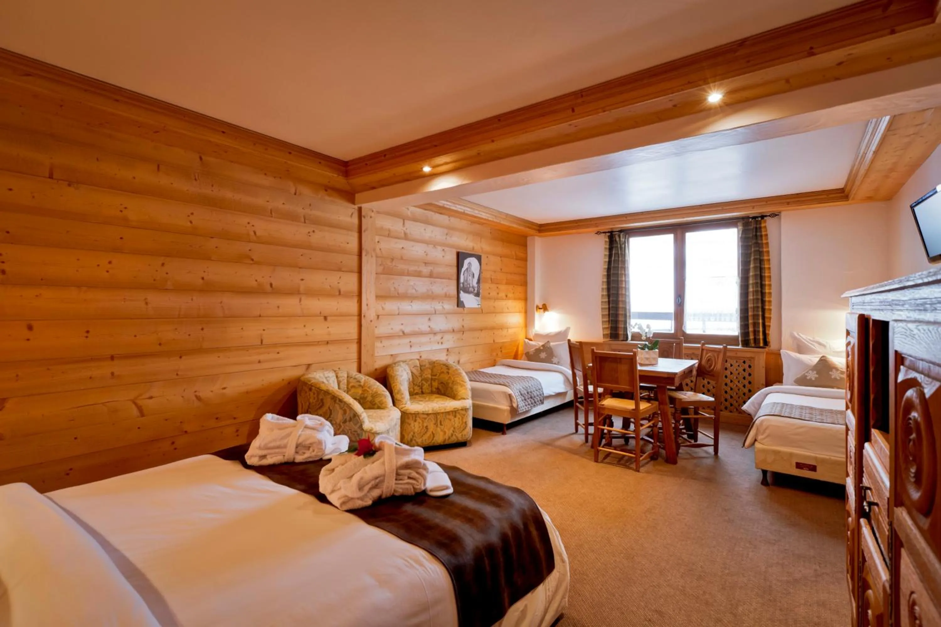 Bed in Hotel les Flocons