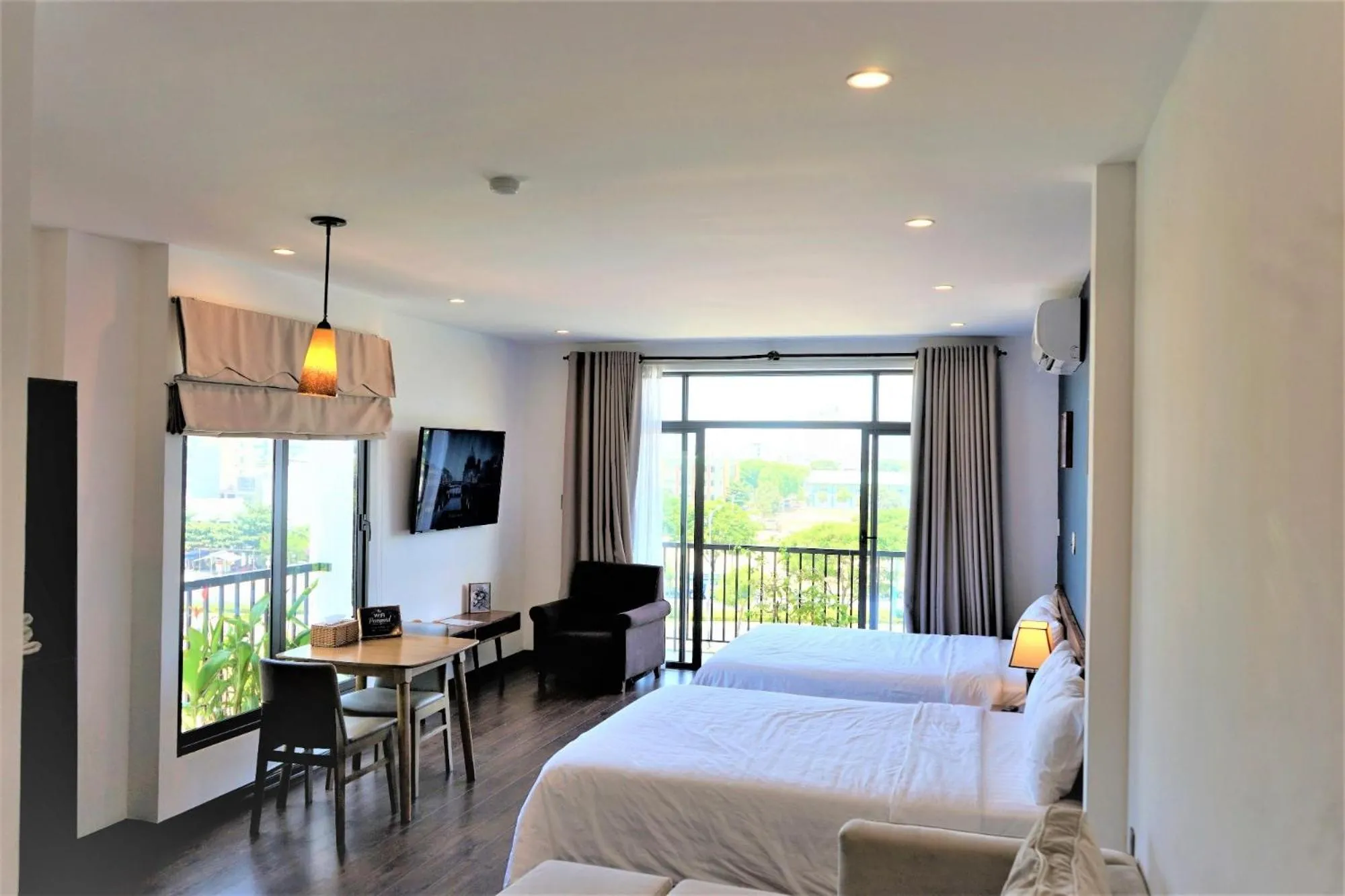 Bed in Oasis Hotel & Apartment