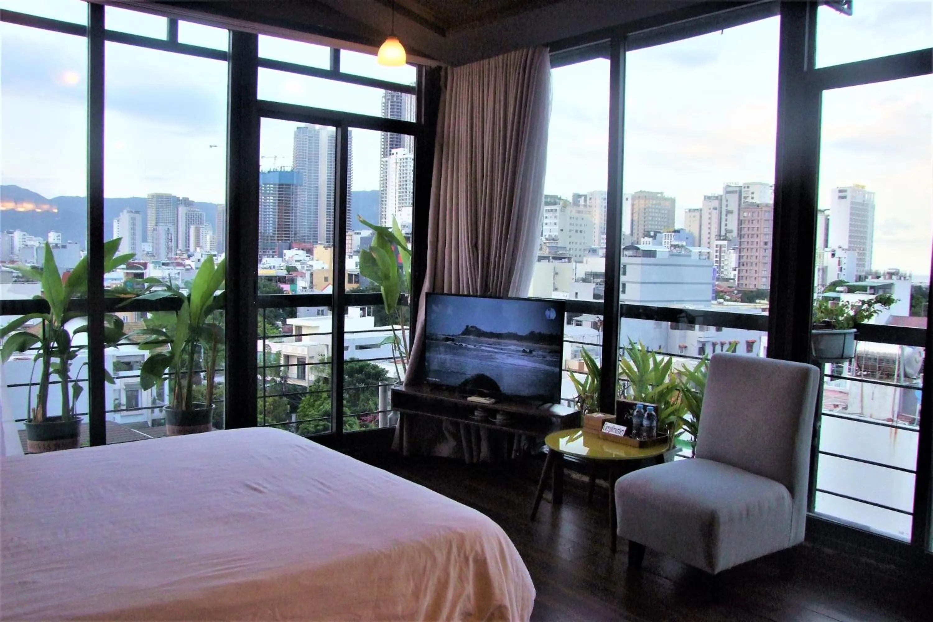 Bed in Oasis Hotel & Apartment