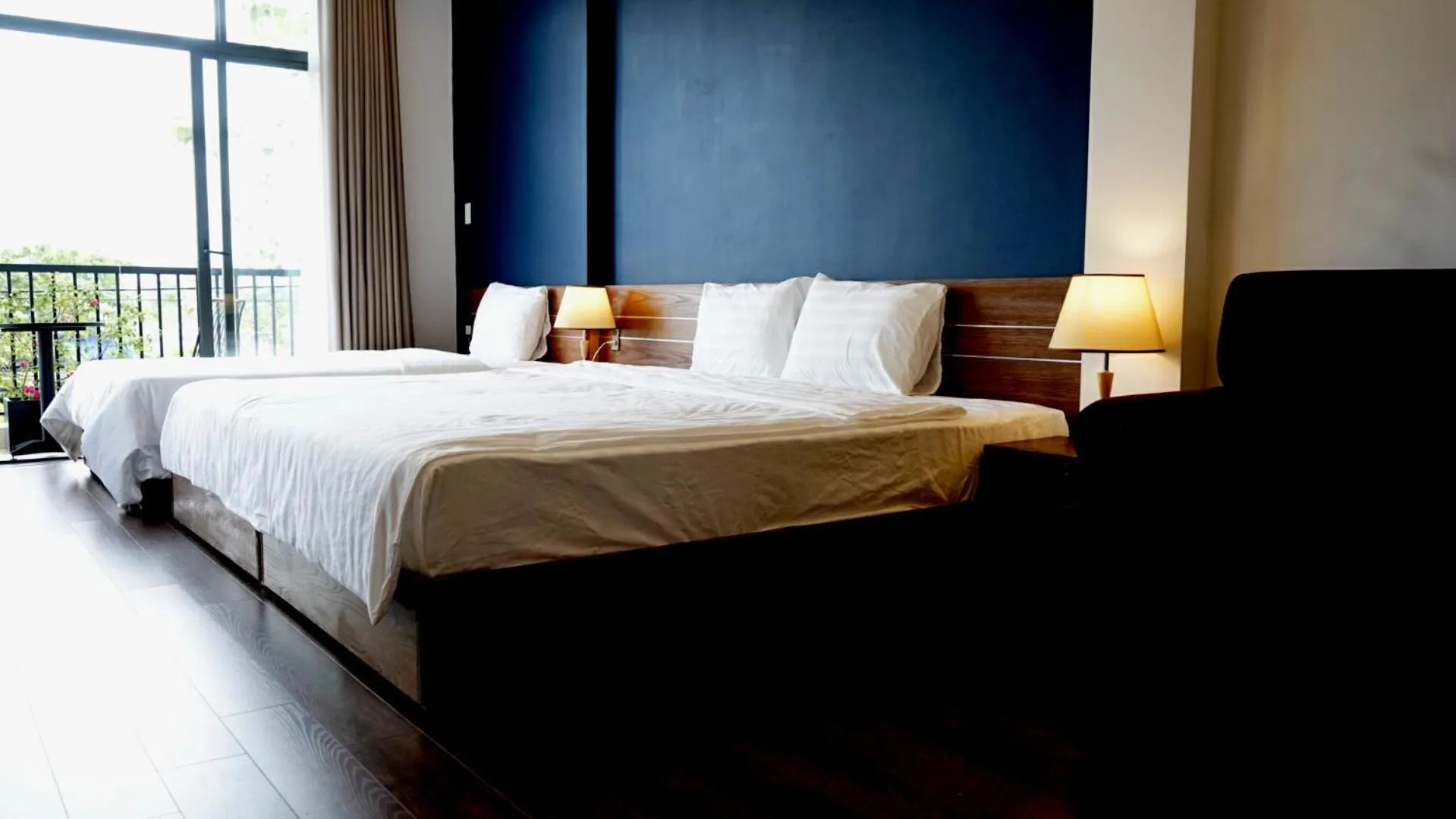 Bed in Oasis Hotel & Apartment