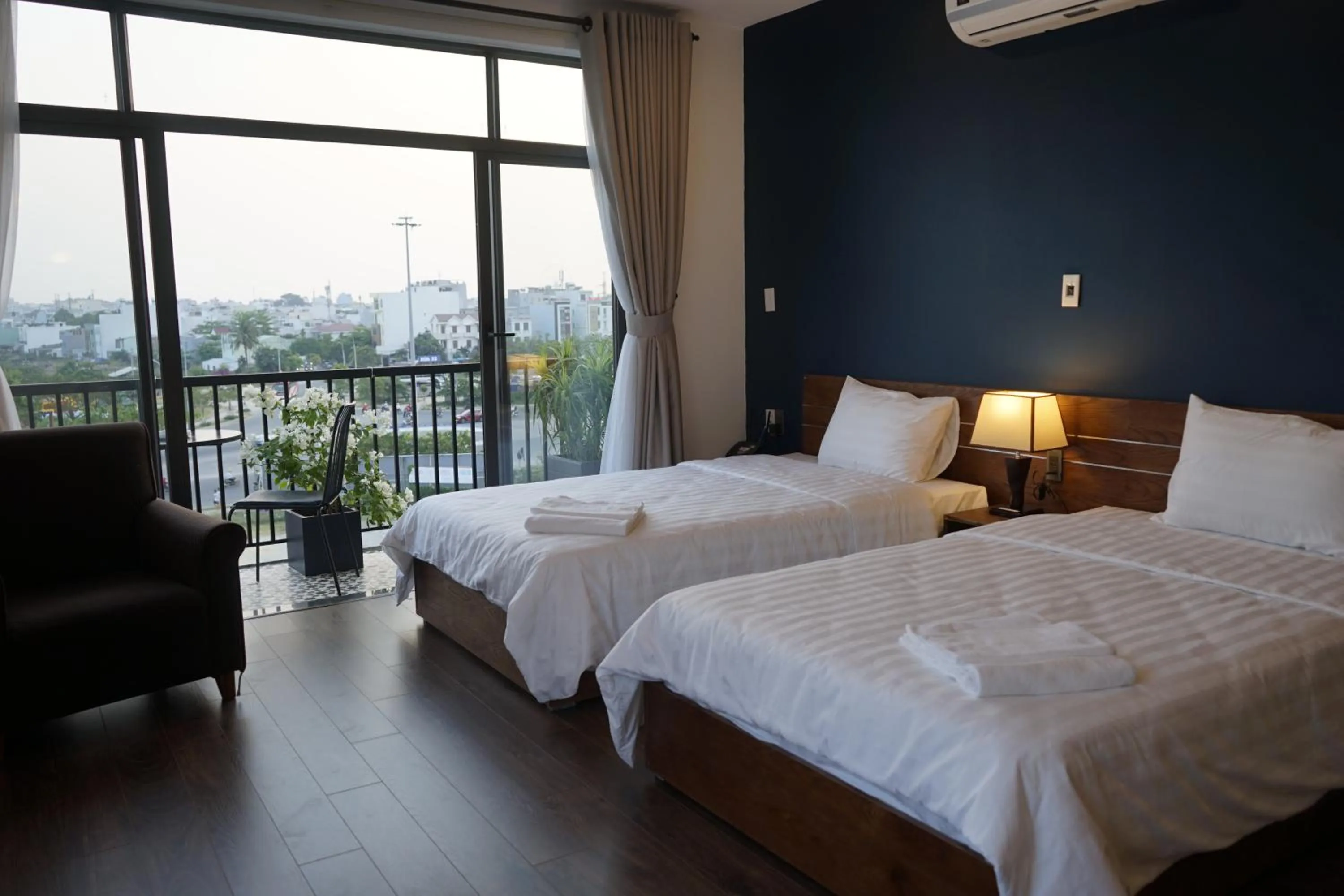 Bed in Oasis Hotel & Apartment