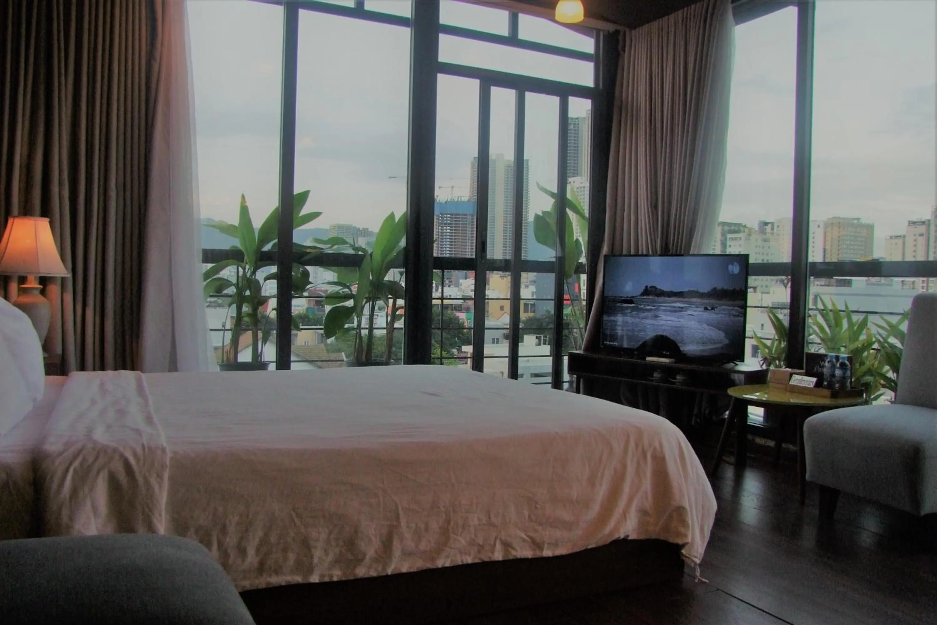 Bed in Oasis Hotel & Apartment