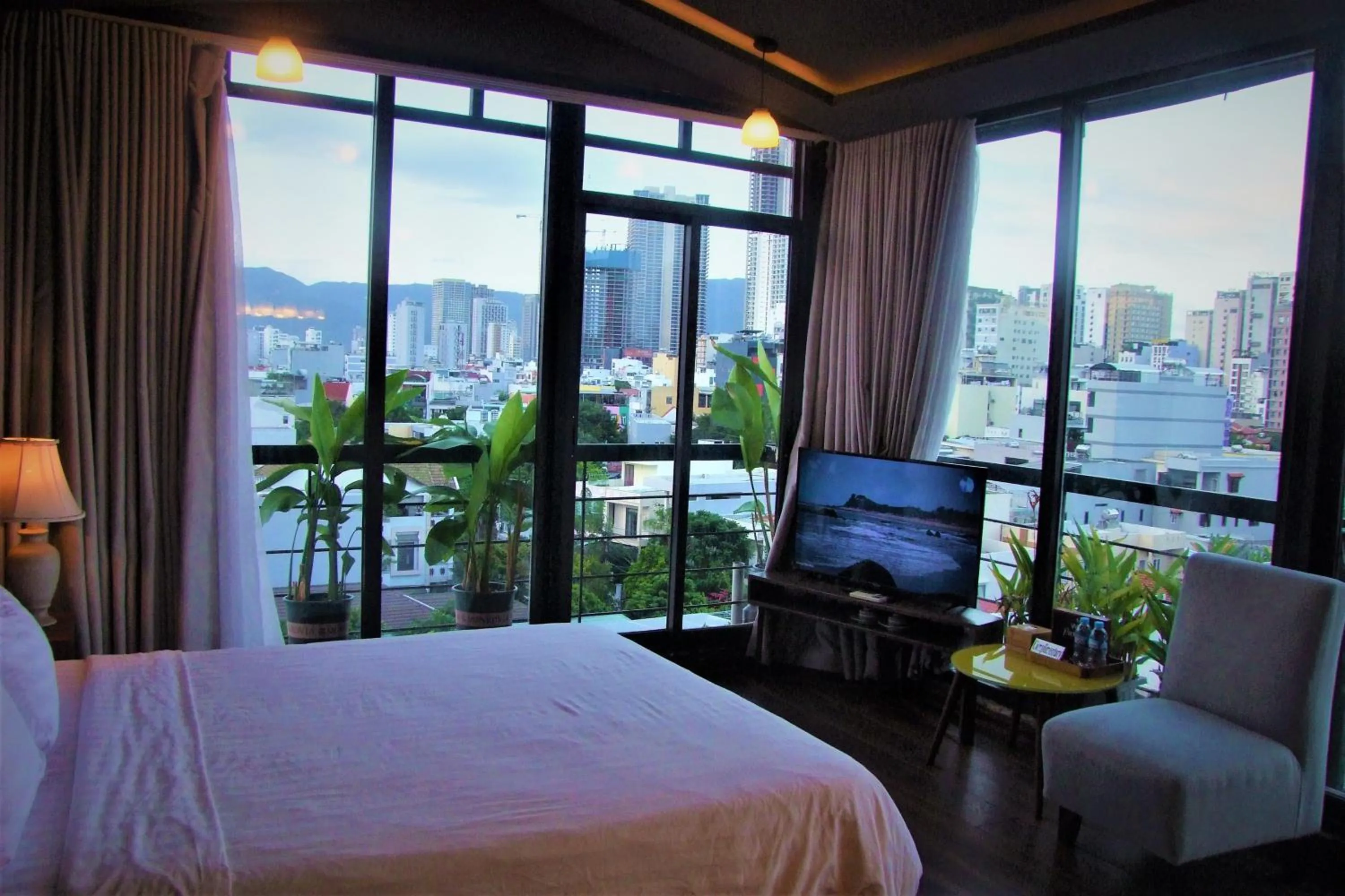 Bed in Oasis Hotel & Apartment