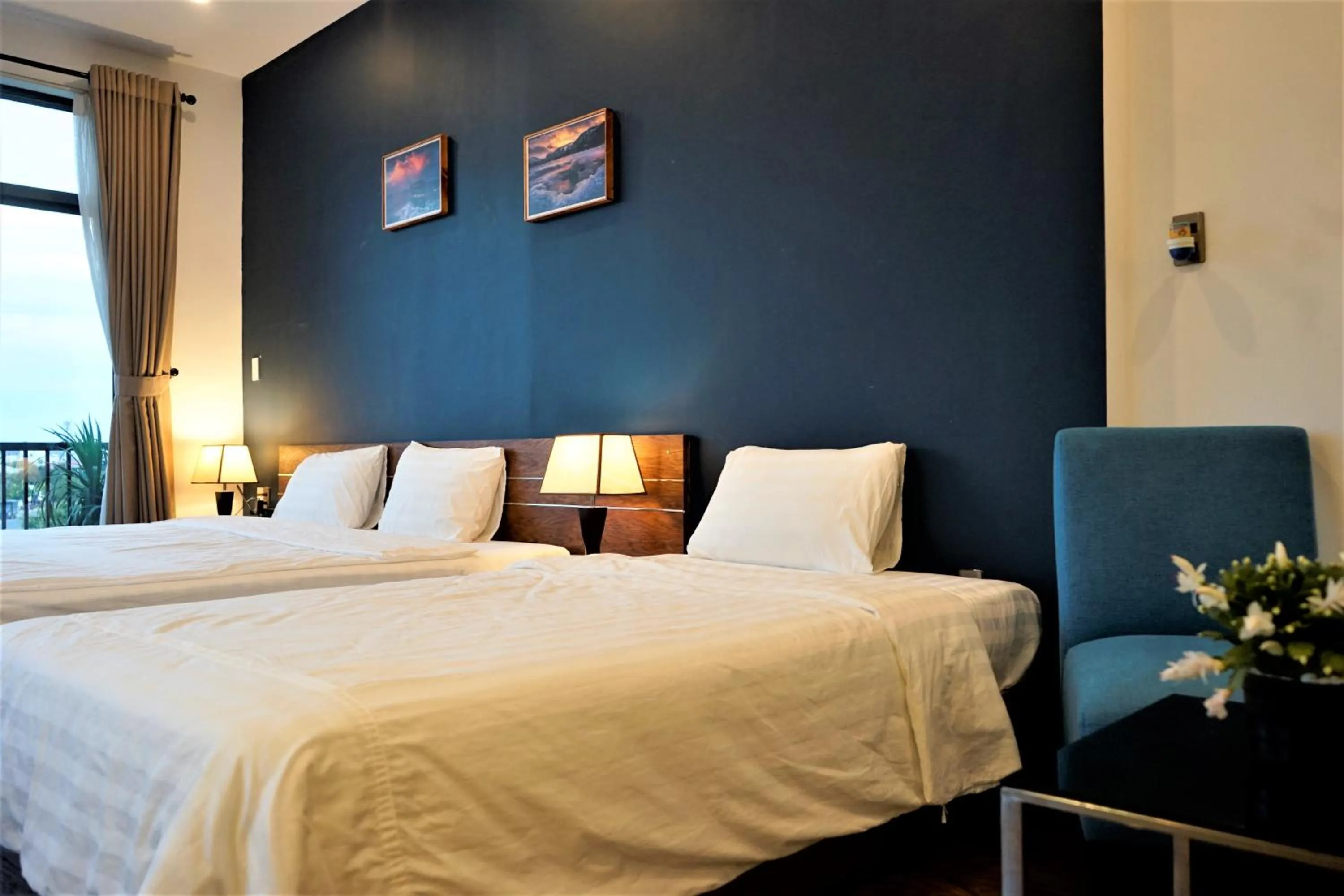 Bed in Oasis Hotel & Apartment