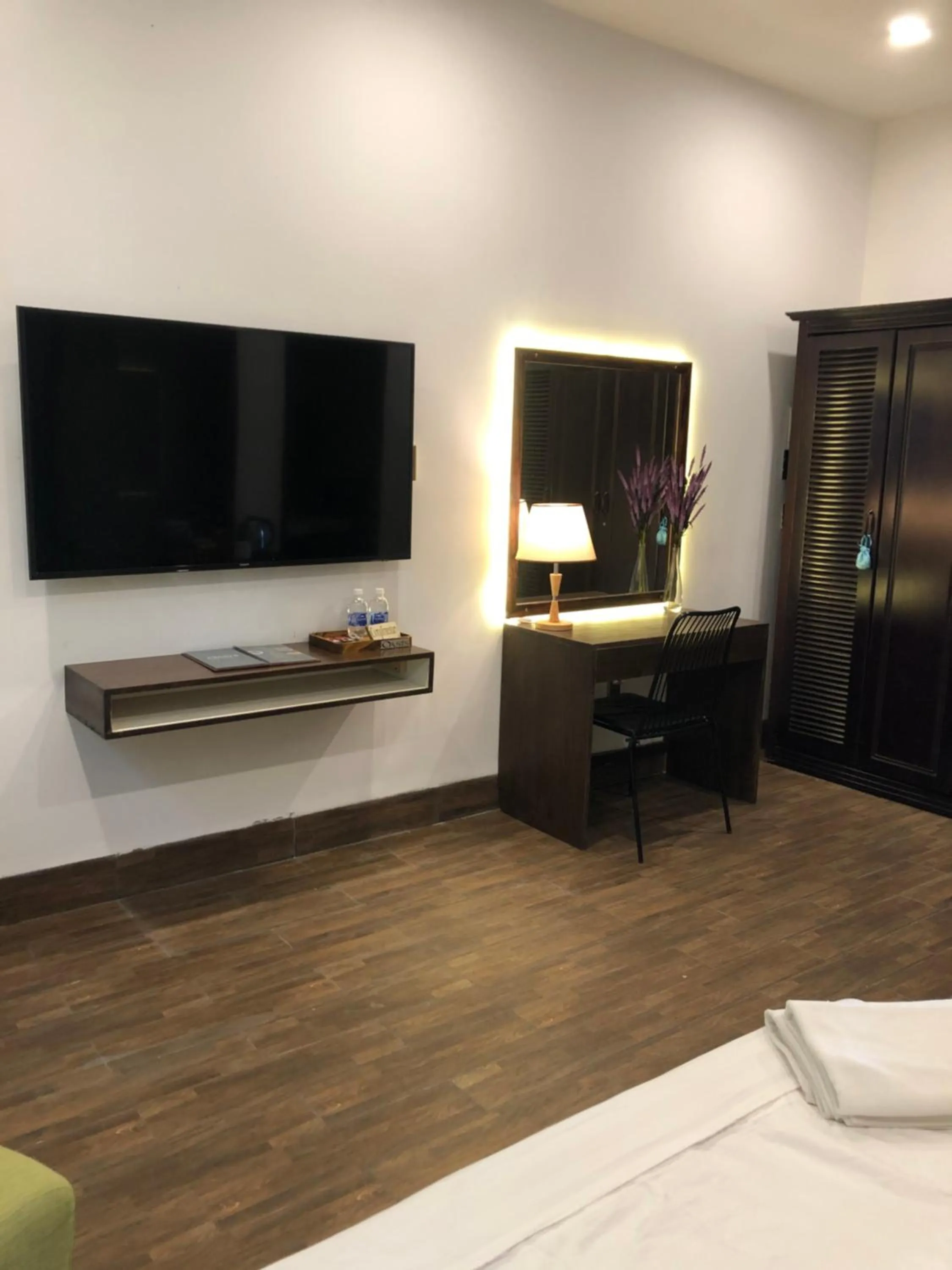 Bed in Oasis Hotel & Apartment