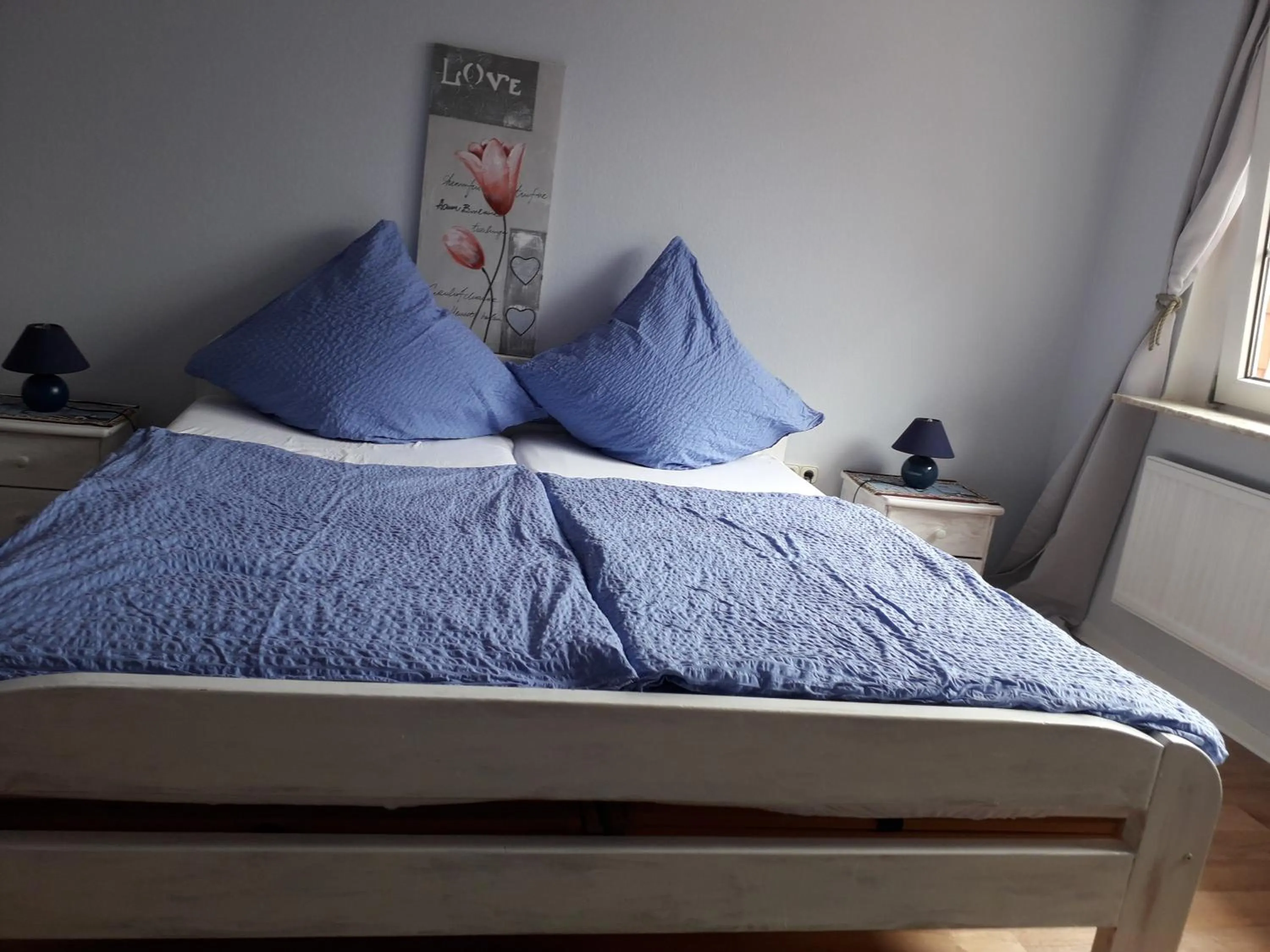 Bed in Pension Norddeicher Straße