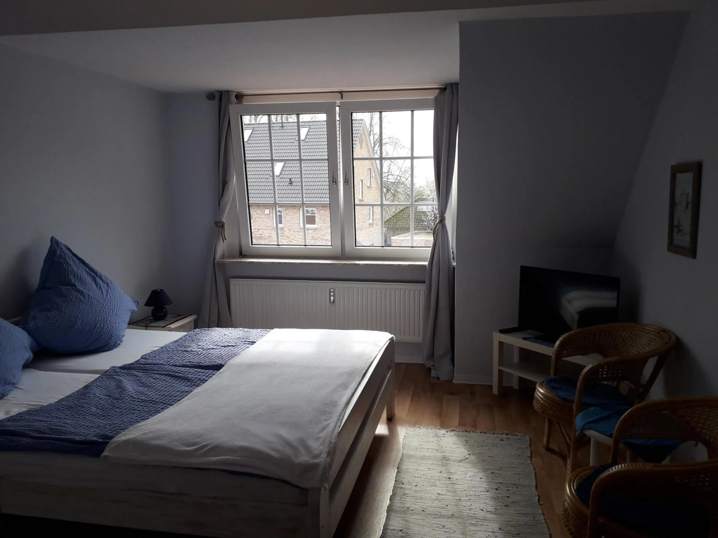 Photo of the whole room, Bed in Pension Norddeicher Straße