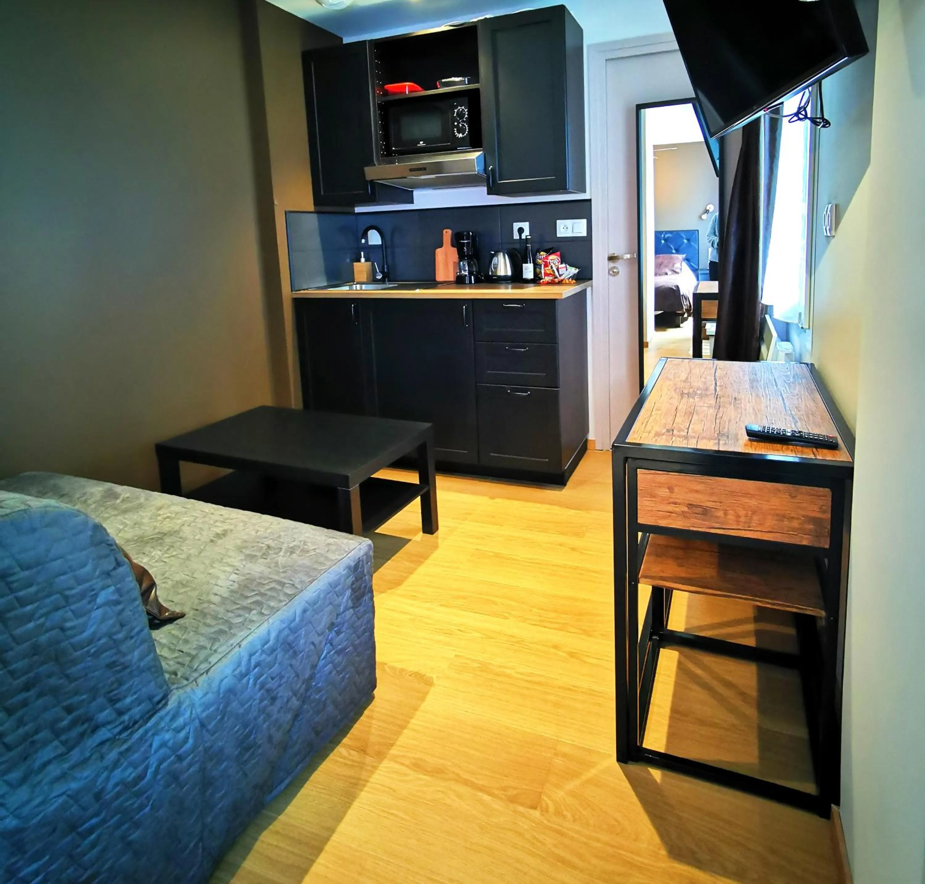 Kitchen or kitchenette in Appart Hotel Relax Spa