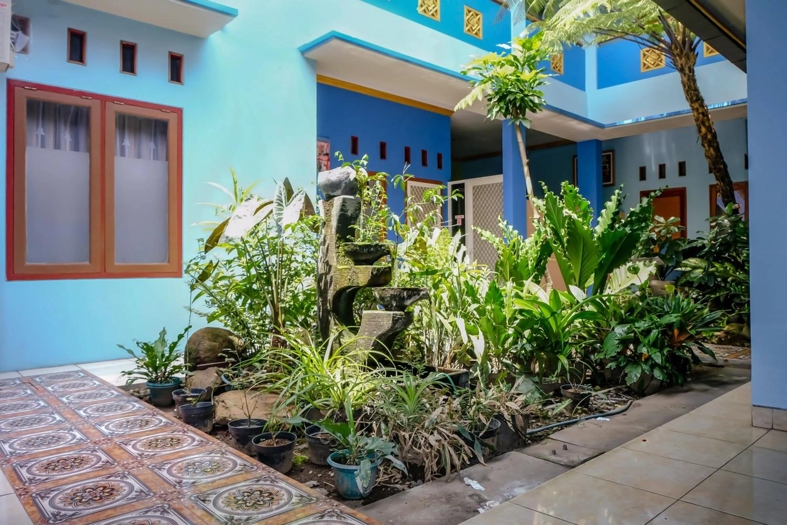 Lobby or reception in Hotel O Guest House Amalia Malang