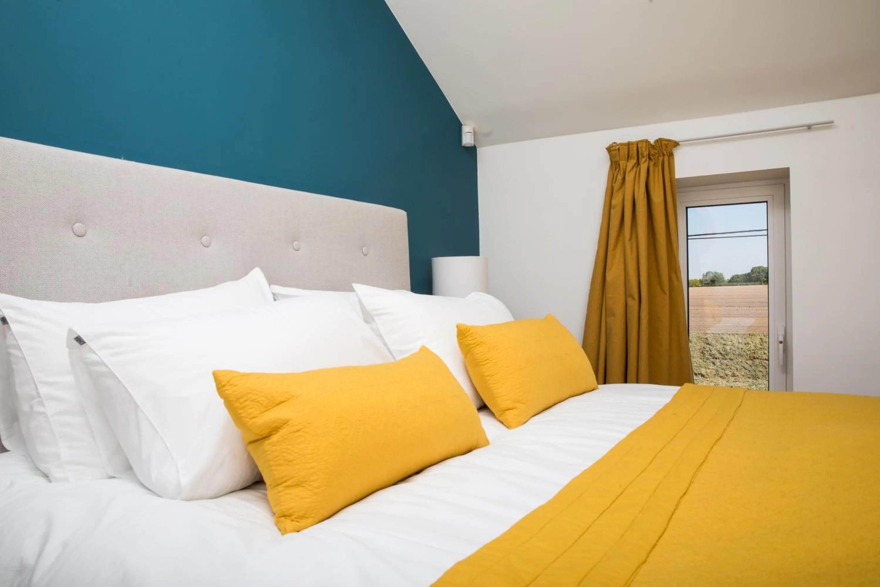 Bed in Chez Spoons B&B