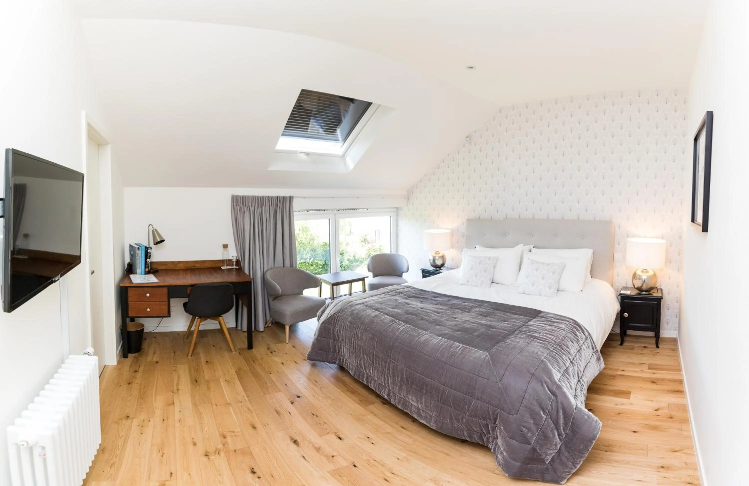 Bed in Chez Spoons B&B