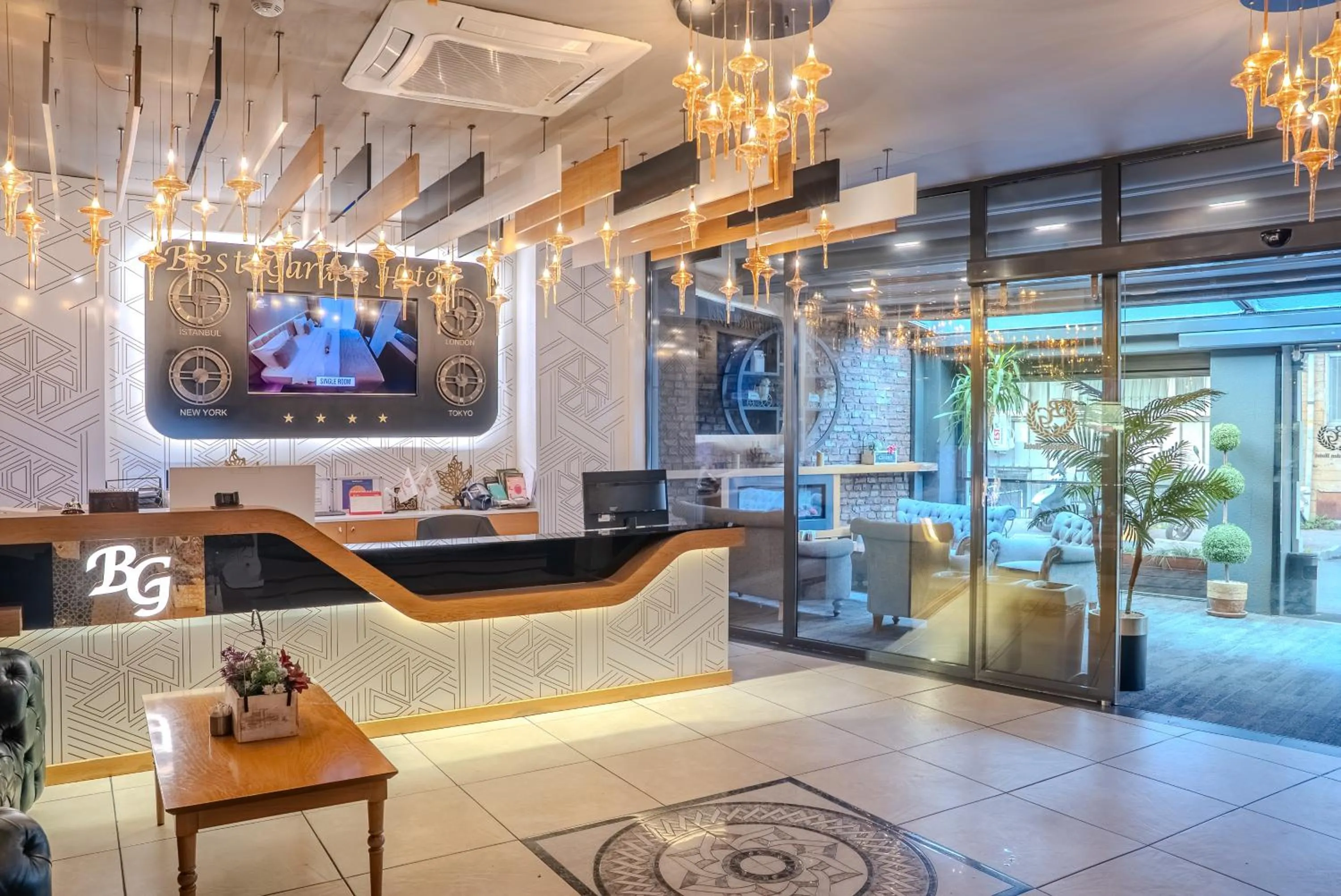Lobby or reception in BEST GARDEN HOTEL