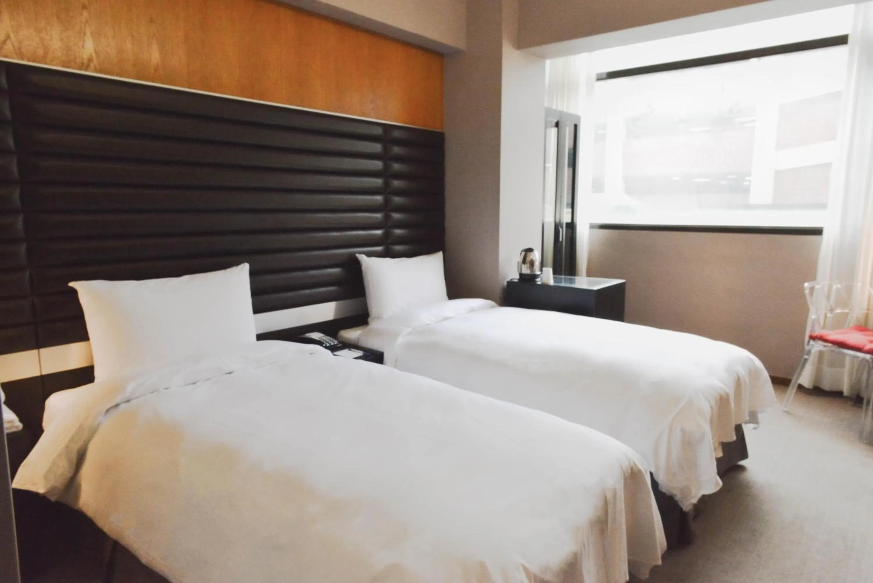 Bed in 新麗旅店 Newful Hotel