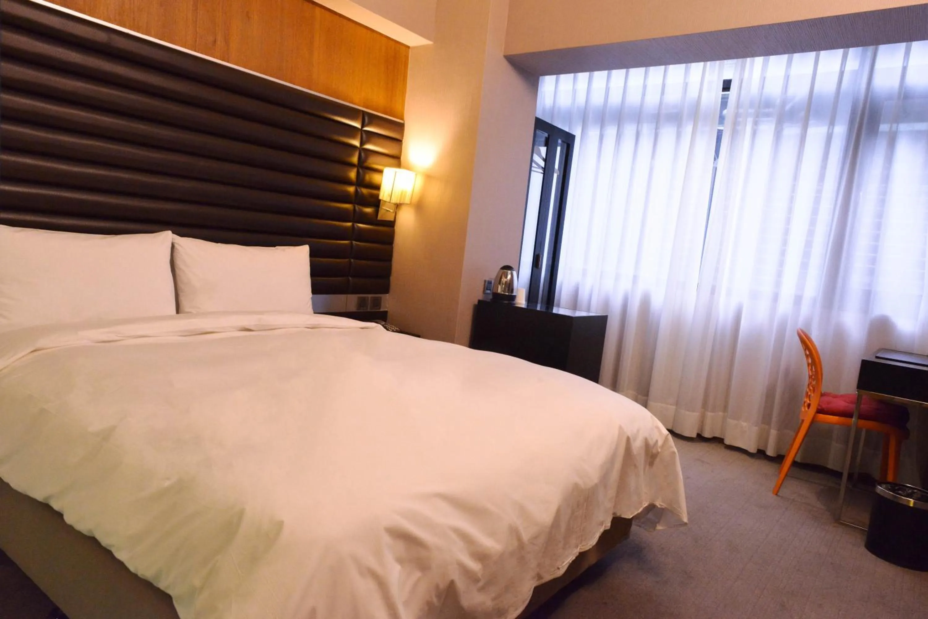 Bed in 新麗旅店 Newful Hotel