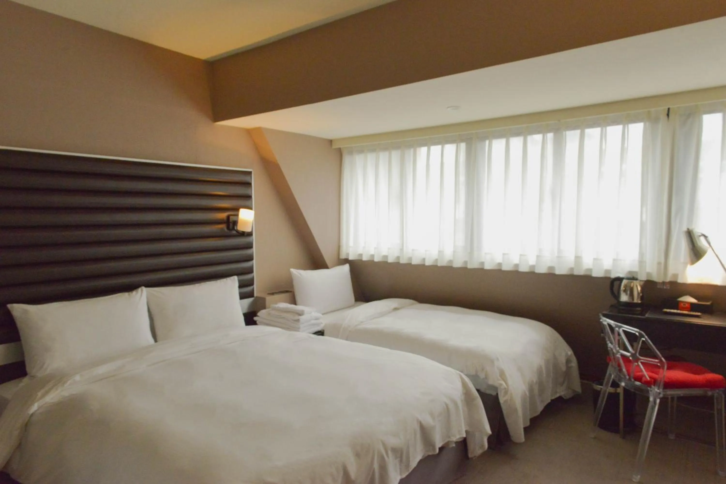 Bed in 新麗旅店 Newful Hotel