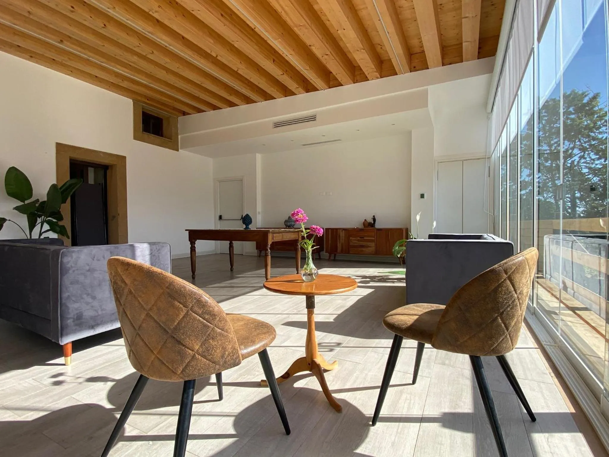 Communal lounge/ TV room in Villa Trigona