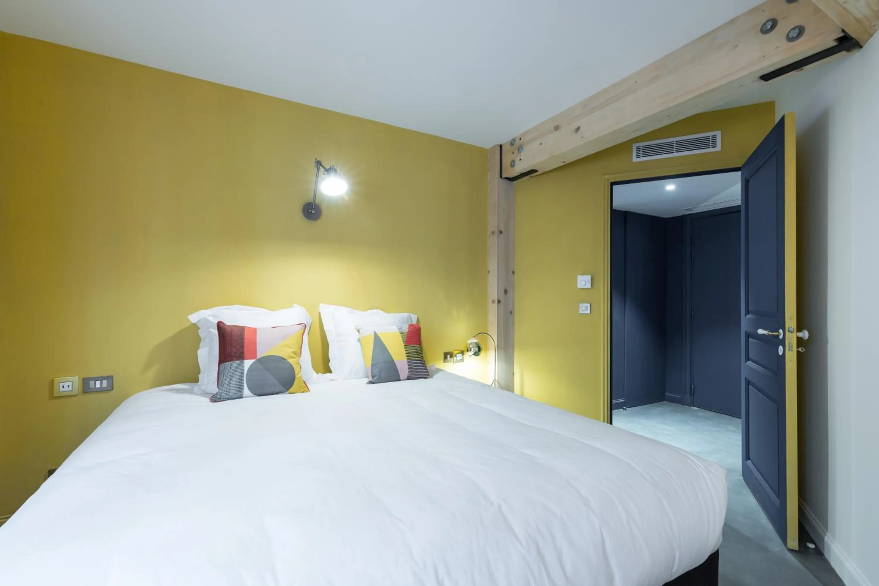 Bed in L'Abeille - Boutique Apartments