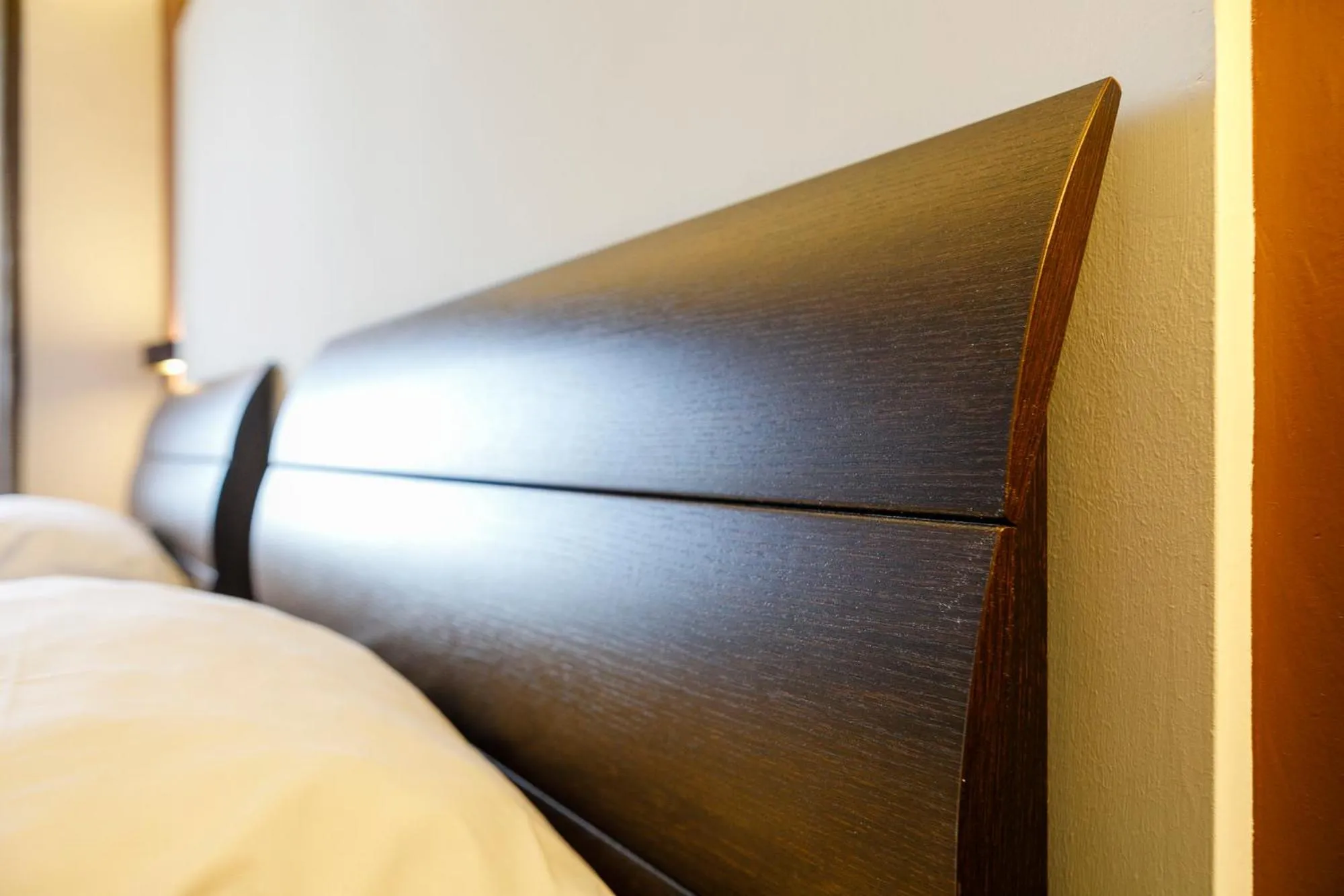 Bed in La Locomotiva Rooms