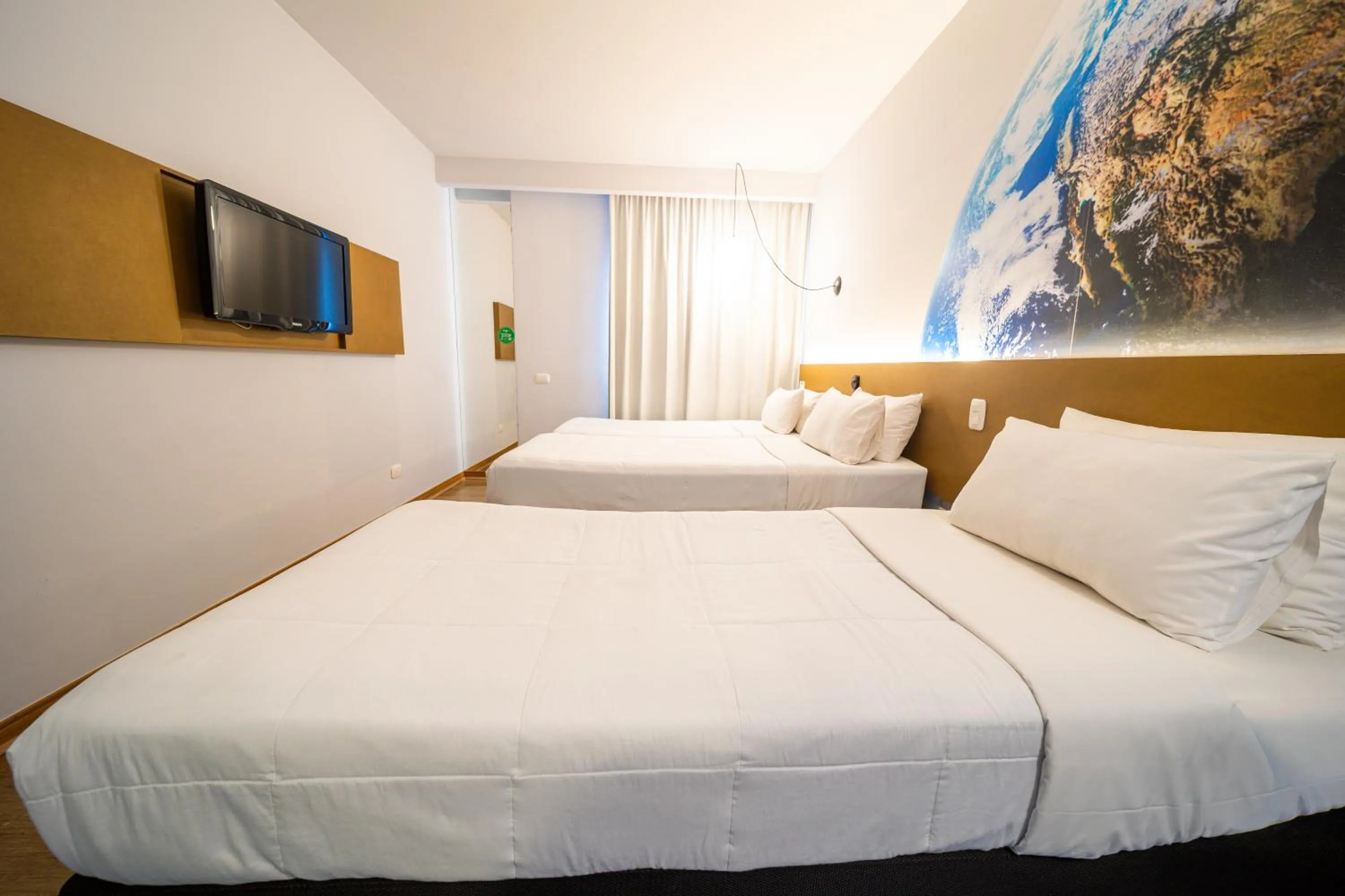 Bedroom, Bed in Hotel Euro Suite Curitiba Batel By Nacional Inn