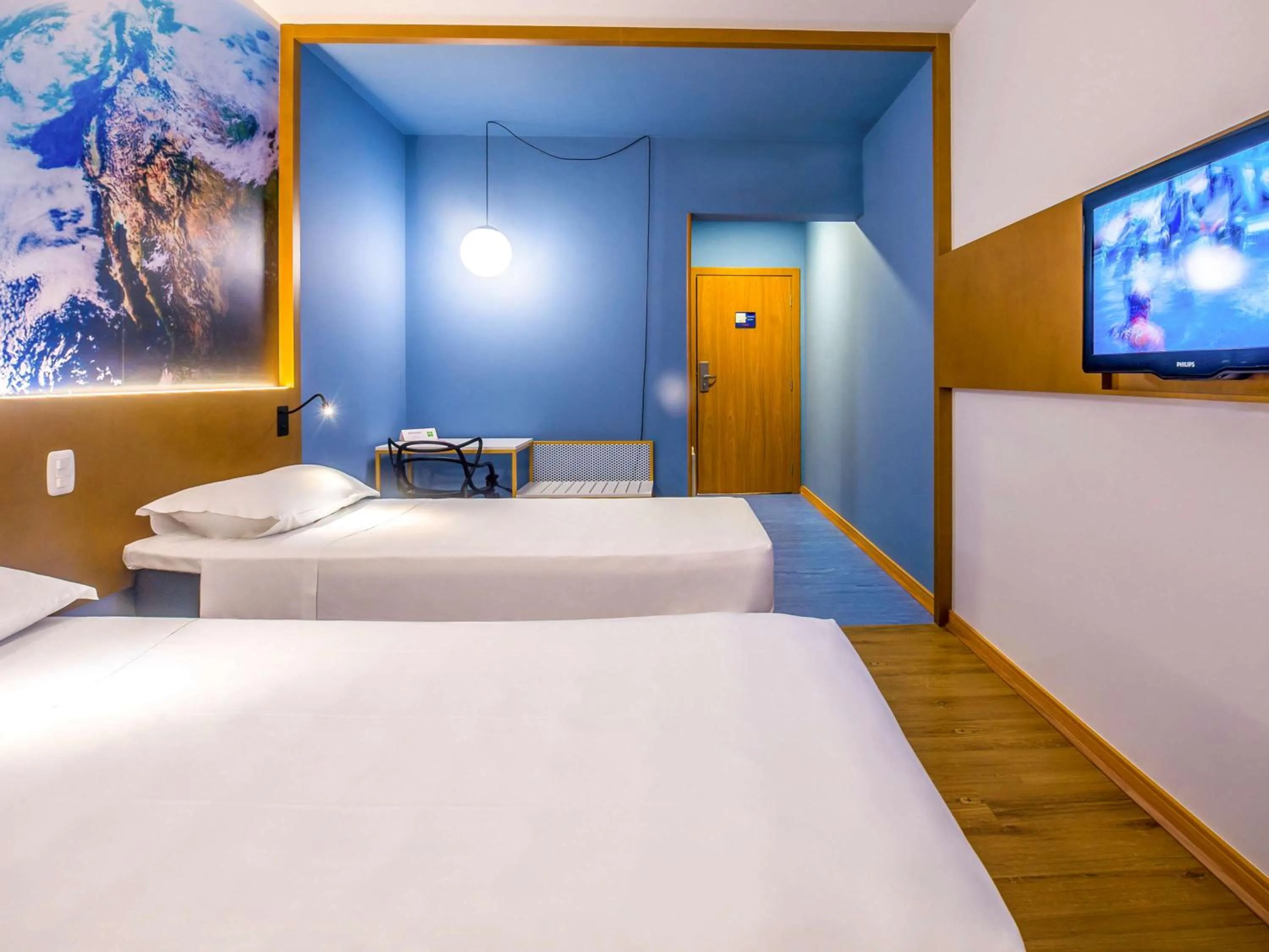 Photo of the whole room, Bed in Hotel Euro Suite Curitiba Batel By Nacional Inn