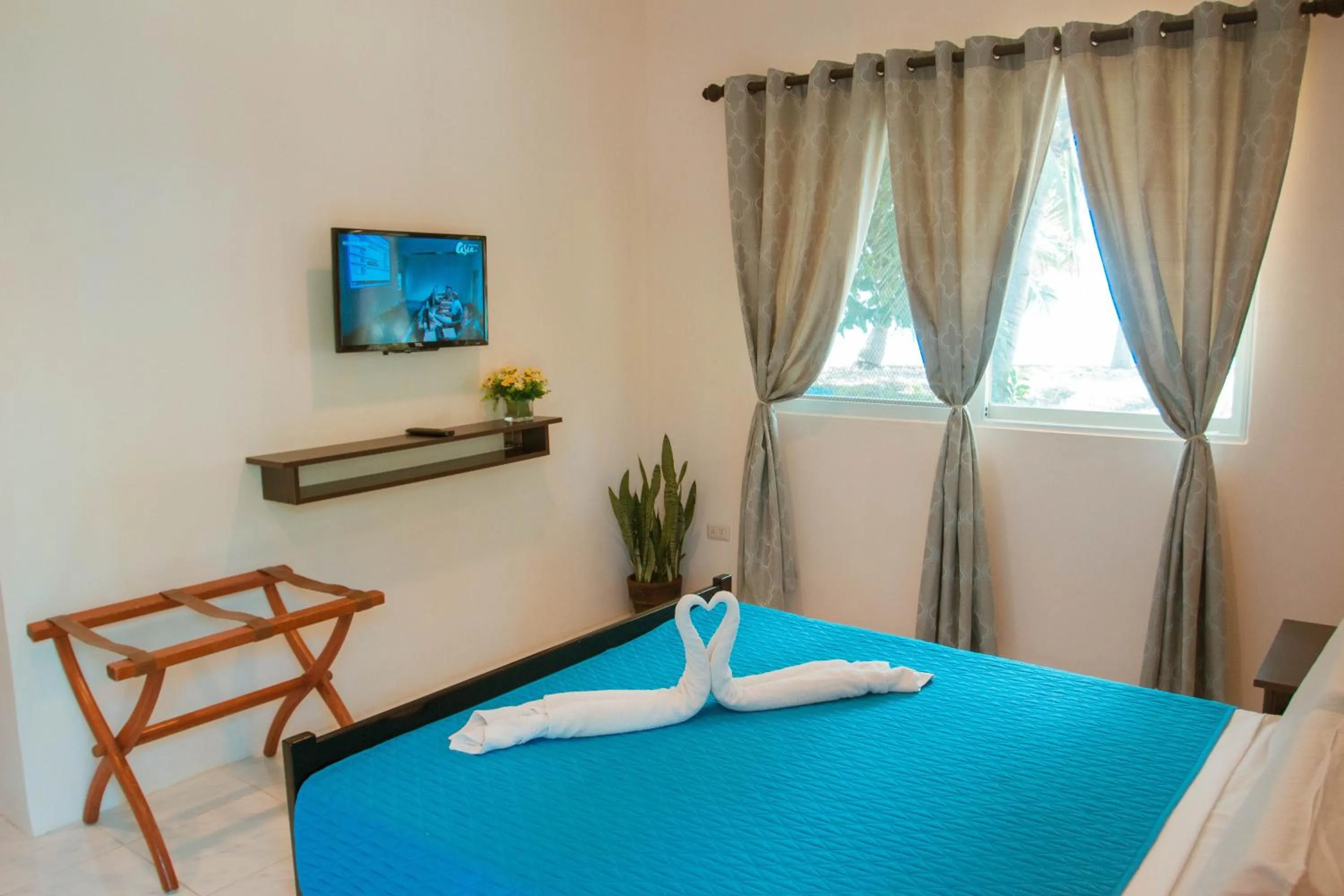 Bed in Estaca Bay Gardens Conference Resort powered by Cocotel